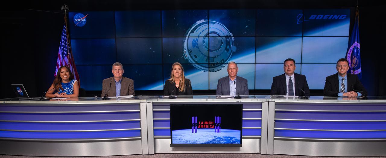 Officials from NASA, Boeing, United Launch Alliance (ULA) and the U.S. Space Force 45th Weather Squadron participate in a prelaunch briefing for NASA’s uncrewed Boeing Orbital Flight Test (OFT-2) at the agency’s Kennedy Space Center in Florida, May 17, 2022. From left to right at the dais are Megan Cruz, NASA Communications; Steve Stich, manager, NASA’s Commercial Crew Program; Dana Weigel, deputy manager, International Space Station Program; Mark Nappi, vice president and manager, Boeing Commercial Crew Program; Gary Wentz, vice president, Government and Commercial Programs, ULA; Will Ulrich, launch weather officer, U.S. Space Force, 45th Weather Squadron. Boeing’s CST-100 Starliner is targeted to launch at 6:54 p.m. EDT on Thursday, May 19, on a ULA Atlas V rocket from Space Launch Complex-41 at Cape Canaveral Space Force Station in Florida to rendezvous and dock with the space station.