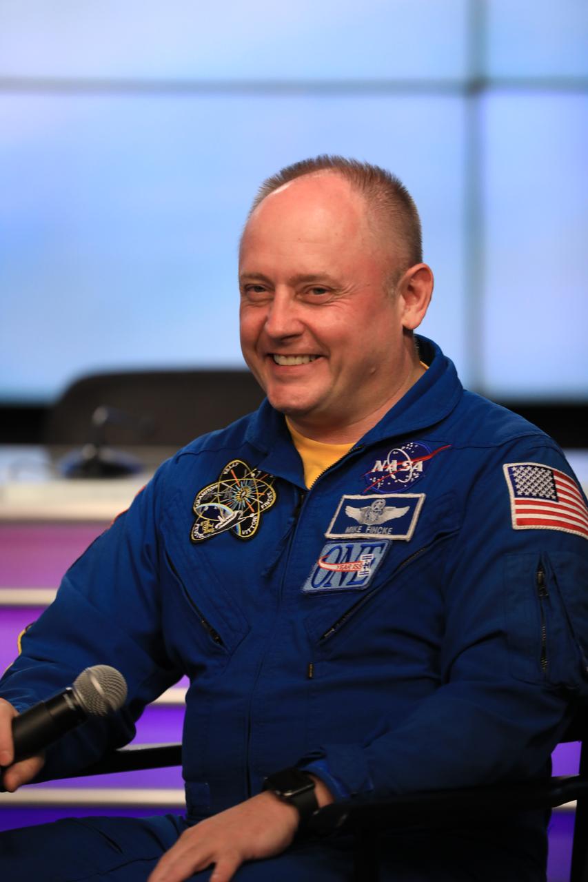 NASA astronaut Mike Finke participates in a Virtual NASA Social Live event at the agency's Kennedy Space Center in Florida on May 18, 2022, in advance of the agency’s Boeing Orbital Flight Test-2 (OFT-2) as part of NASA's Commercial Crew Program. Boeing’s CST-100 Starliner is targeted to launch at 6:54 p.m. EDT on Thursday, May 19, on a United Launch Alliance Atlas V rocket from Space Launch Complex-41 at Cape Canaveral Space Force Station in Florida to rendezvous and dock with the International Space Station.