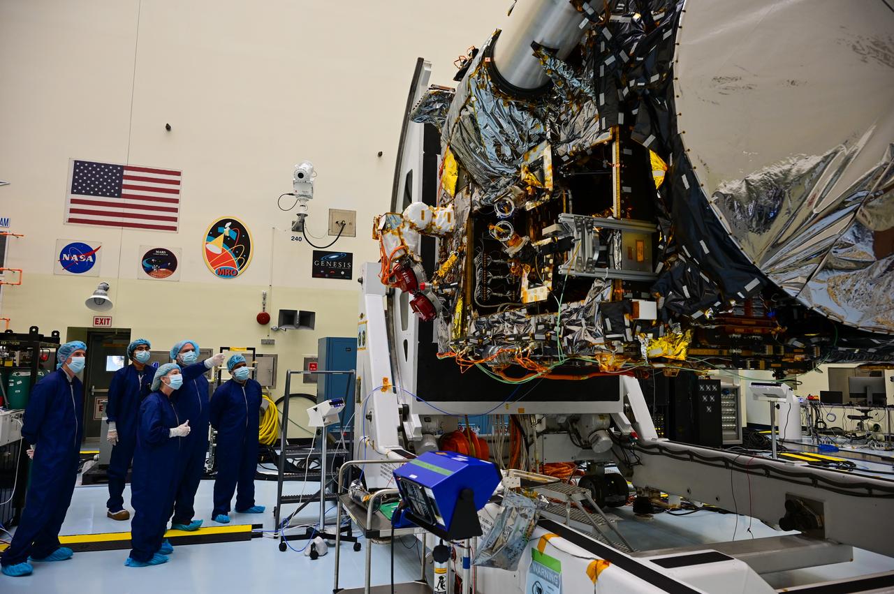 NASA Deputy Administrator Pam Melroy visits Kennedy Space Center in Florida and receives a briefing by team members from the Jet Propulsion Laboratory on the agency’s Psyche spacecraft inside the Payload Hazardous Servicing Facility on May 19, 2022. Melroy is standing in front of the group. The mission is targeting an Aug. 1 launch atop a SpaceX Falcon Heavy rocket from Launch Complex 39A at Kennedy. The spacecraft will use solar-electric propulsion to travel approximately 1.5 billion miles to rendezvous with its namesake asteroid in 2026. The Psyche mission is led by Arizona State University. NASA’s Jet Propulsion Laboratory, which is managed for the agency by Caltech in Pasadena, California, is responsible for the mission’s overall management, system engineering, integration and testing, and mission operations. Maxar Technologies in Palo Alto, California, provided the high-power solar electric propulsion spacecraft chassis. NASA’s Launch Services Program (LSP), based at Kennedy, is managing the launch. 