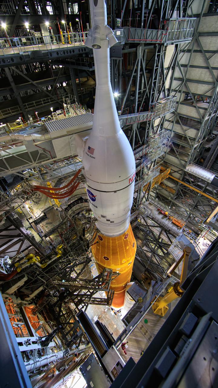 With all of the work platforms retracted, NASA’s Space Launch System and Orion spacecraft atop the mobile launcher are in view in High Bay 3 of the Vehicle Assembly Building at the agency’s Kennedy Space Center in Florida on June 3, 2022. The crawler-transporter, driven by engineers, will slide under the Artemis I stack atop the mobile launcher and carry it to Launch Complex 39B for a wet dress rehearsal test ahead of the Artemis I launch. Artemis I will be the first integrated test of the SLS and Orion spacecraft. In later missions, NASA will land the first woman and the first person of color on the surface of the Moon, paving the way for a long-term lunar presence and serving as a steppingstone on the way to Mars.