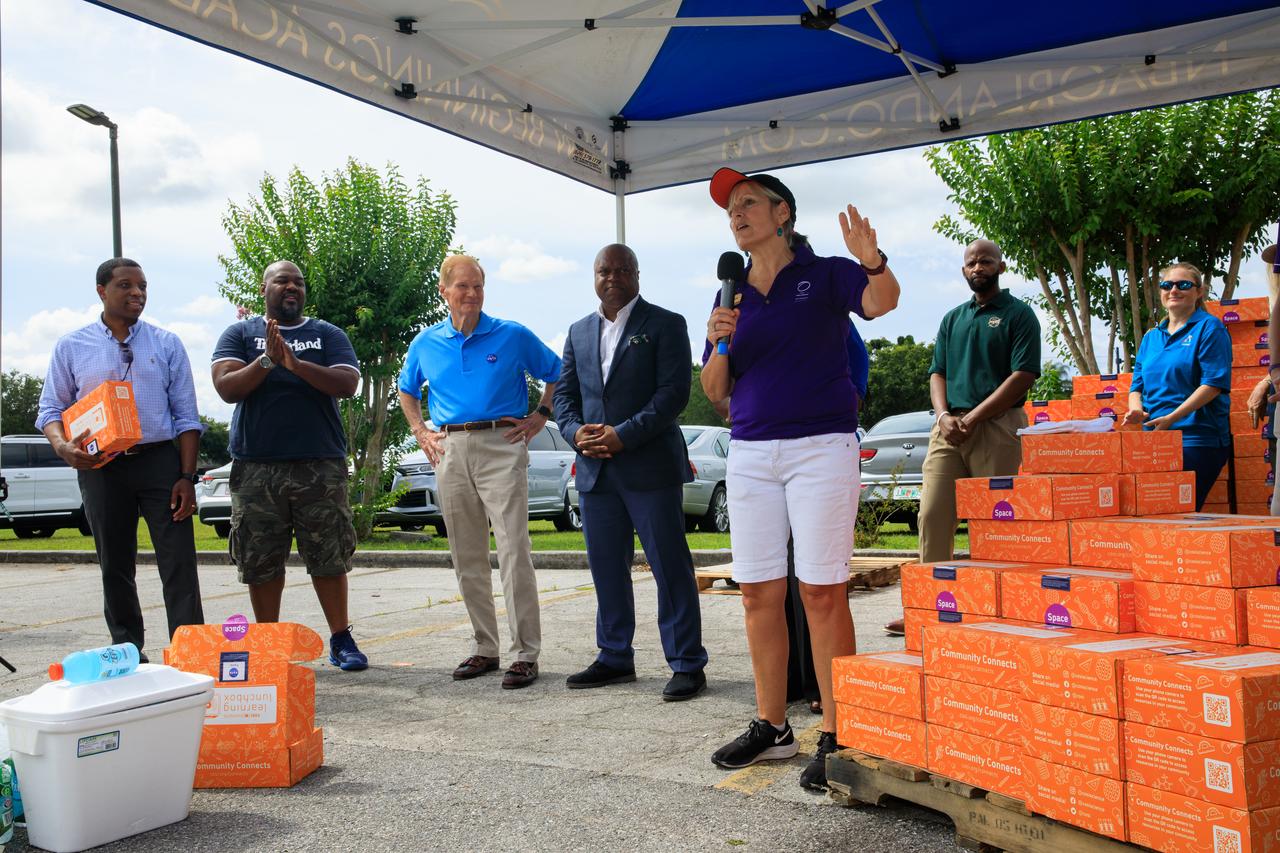 Dr. Frederic Bertley (center), president and CEO, Center of Science and Industry (COSI), speaks at New Beginnings Church – The Gathering Place in Orlando, Florida on Friday, June 3, as part of the launch of a new initiative to deliver food and hands-on science, technology, engineering, and math kits, called Learning Lunchboxes. NASA Administrator Bill Nelson and other agency representatives were on hand to hand out the lunchboxes, which are aimed at inspiring and educating youth and families about NASA’s upcoming Artemis missions, including landing the first woman and person of color on the Moon and helping prepare for human exploration of Mars. Along with COSI, NASA’s partners on the initiative include the Second Harvest Food Bank and the Orlando Science Center. The NASA Artemis Learning Lunchbox is made possible through NASA’s Teams Engaging Affiliated Museums and Informal Institutions (TEAM II) program. NASA Learning Lunchboxes provide five space-focused learning activities that showcase the diversity of STEM at NASA. COSI will distribute 30,000 NASA Learning Lunchboxes at local food banks across the country to help feed hungry lives and feed hungry minds. This innovative, community-based model will bring together other science centers and museums, afterschool providers, and community leaders to highlight the importance of STEM. This project also includes digital extension resources.