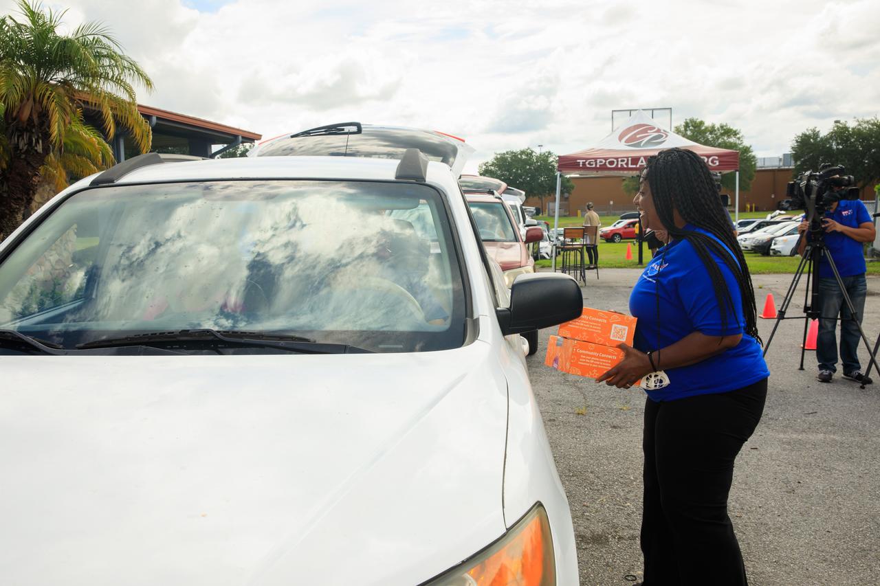 Barbara Brown, director of the Exploration Research and Technology Program at Kennedy Space Center in Florida, helped kick off a new initiative to deliver food and hands-on science, technology, engineering, and math kits, called Learning Lunchboxes, at New Beginnings Church – The Gathering Place in Orlando, Florida on Friday, June 3. The lunchboxes are aimed at inspiring and educating youth and families about NASA’s upcoming Artemis missions, which includes landing the first woman and person of color on the Moon and helping prepare for human exploration of Mars. Partners on the initiative with NASA include the Center of Science and Industry, the Second Harvest Food Bank, and the Orlando Science Center. The NASA Artemis Learning Lunchbox is made possible through NASA’s Teams Engaging Affiliated Museums and Informal Institutions (TEAM II) program. NASA Learning Lunchboxes provide five space-focused learning activities that showcase the diversity of STEM at NASA. COSI will distribute 30,000 NASA Learning Lunchboxes at local food banks across the country to help feed hungry lives and feed hungry minds. This innovative, community-based model will bring together other science centers and museums, afterschool providers, and community leaders to highlight the importance of STEM. This project also includes digital extension resources.