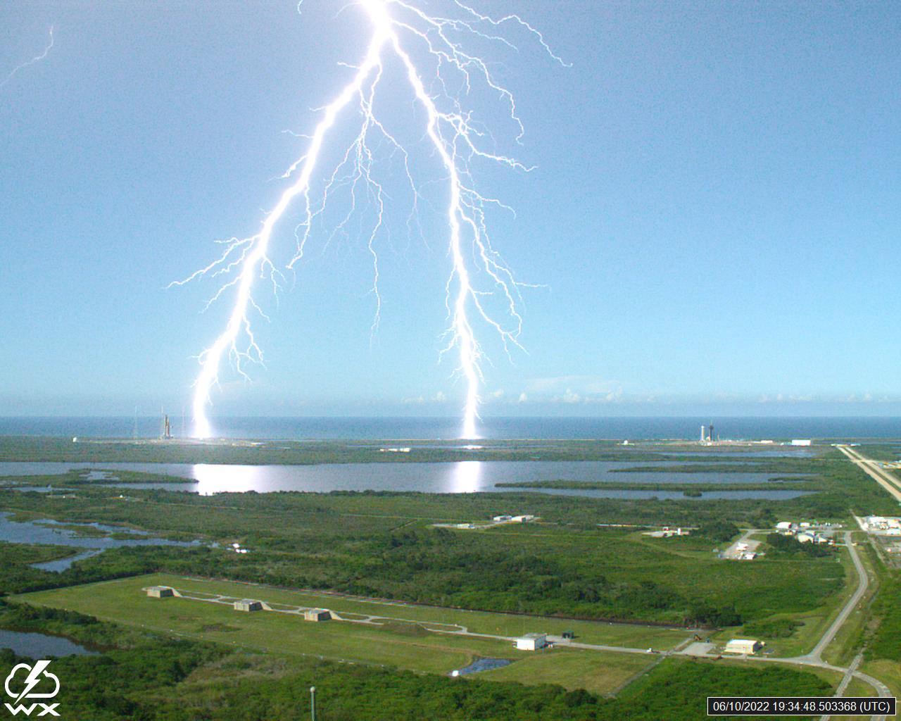 A lightning strike was recorded at Launch Complex 39B at NASA’s Kennedy Space Center in Florida on June 10, 2022. NASA’s Space Launch System (SLS) and Orion spacecraft atop the mobile launcher are on the launch pad in preparation for the Artemis I mission. The lightning strike was recorded by cameras stationed at the pad and mobile launcher using a special filter called a “clear day frame,” which provides an overlay of the raw frame on a reference image. Artemis I will be the first integrated test of the SLS and Orion spacecraft. In later missions, NASA will land the first woman and the first woman of color on the surface of the Moon, paving the way for a long-term lunar presence and serving as a steppingstone on the way to Mars. 