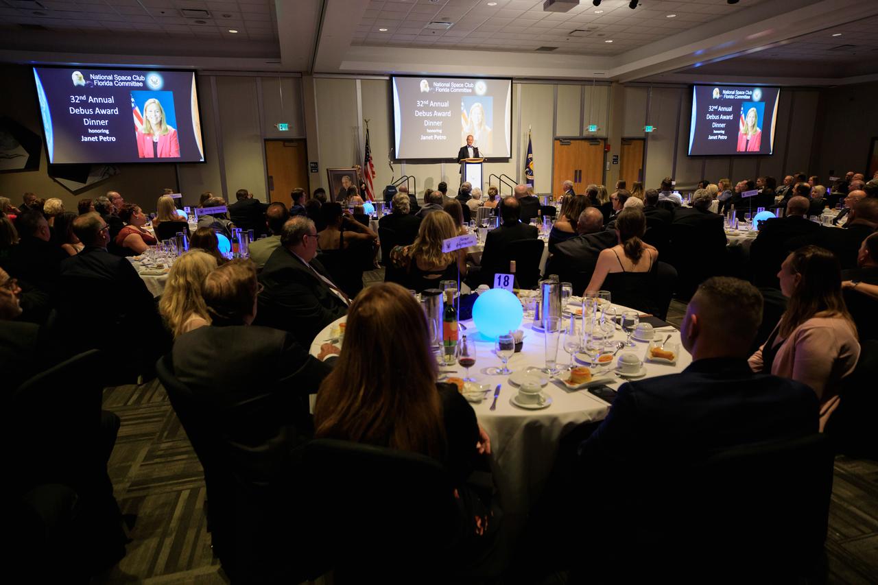 Scott Henderson, vice president of Test and Operations at Blue Origin, speaks at a ceremony honoring Kennedy Space Center Director Janet Petro with the Dr. Kurt H. Debus Award on June 24, 2022, at the Florida spaceport’s visitor complex. The National Space Club Florida Committee presented Petro with the prestigious award for her contributions to America’s aerospace efforts within the state of Florida. The award – originating in 1990 – is named after Kennedy’s first director.