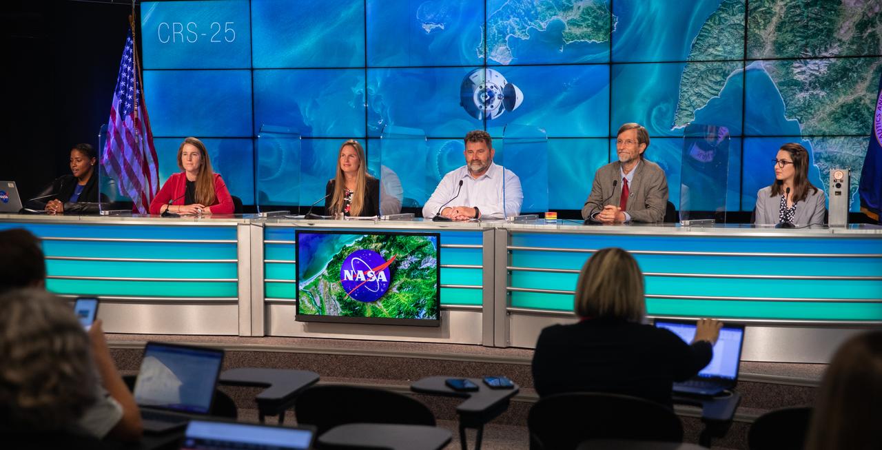 A climate conversation is held at NASA’s Kennedy Space Center in Florida on July 13, 2022, leading up to SpaceX’s 25th Commercial Resupply Services mission for NASA to the International Space Station. Participants, from left are Moderator Tylar Greene, NASA Communications; Kate Calvin, NASA’s chief scientist and climate advisor; Heidi Parris, associate scientist, International Space Station Program; Mike Roberts, chief scientist, ISS National Lab; Rob Green, JPL senior research scientist and EMIT (Earth Surface Mineral Dust Source Investigation) principal investigator; and  Paula do Vale Pereira, BeaverCube, Massachusetts Institute of Technology. The Dragon capsule atop SpaceX’s Falcon 9 rocket is scheduled to lift off from Kennedy’s Launch Complex 39A on July 14 at 8:44 p.m. EDT. Dragon will deliver more than 5,800 pounds of cargo, including a variety of NASA investigations, to the space station. 