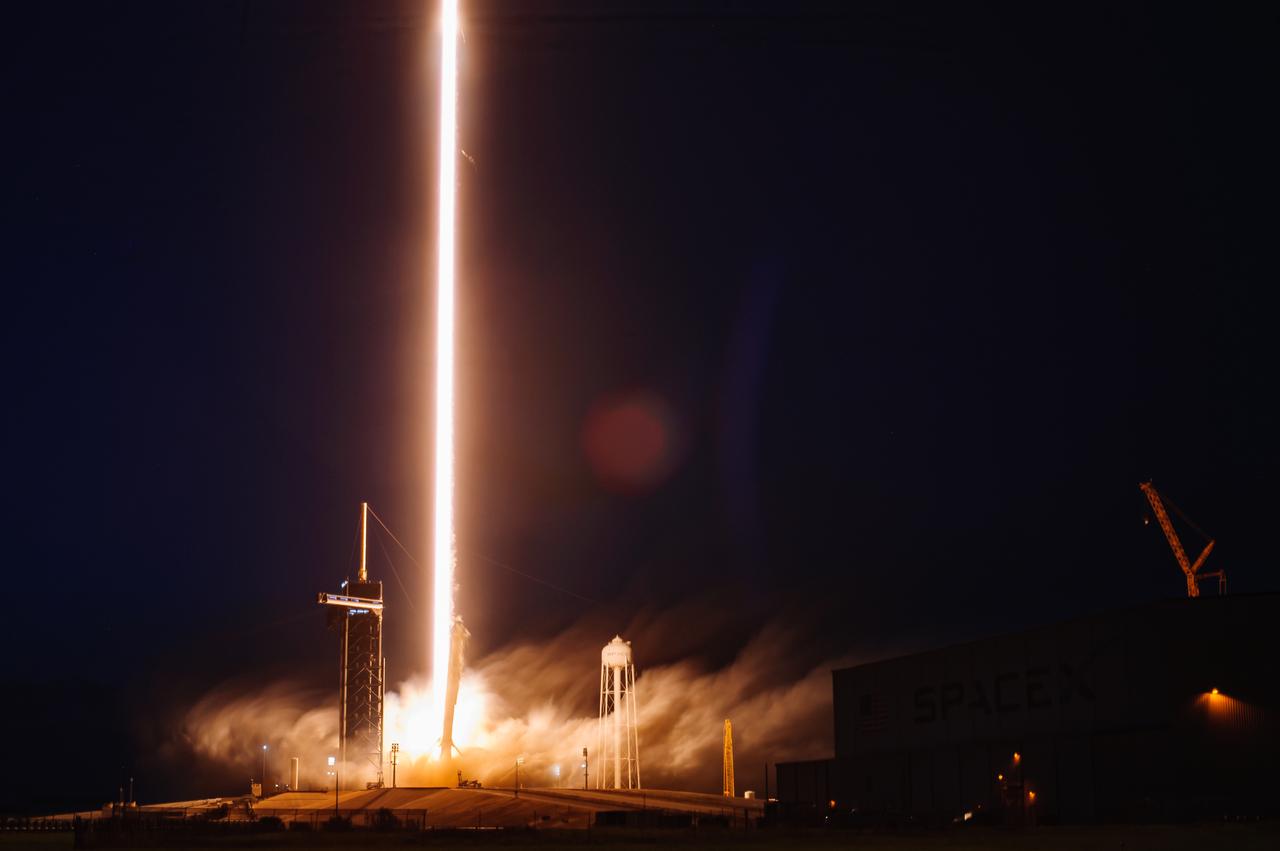 A bright white trail is in view after the SpaceX Falcon 9 rocket carrying the Dragon capsule lifts off from Launch Complex 39A at NASA’s Kennedy Space Center in Florida on July 14, 2022, on the company’s 25th Commercial Resupply Services mission for the agency to the International Space Station. Liftoff was at 8:44 p.m. EDT. Dragon will deliver more than 5,800 pounds of cargo, including a variety of NASA investigations, to the space station. The spacecraft is expected to spend about a month attached to the orbiting outpost before it returns to Earth with research and return cargo, splashing down off the coast of Florida. 