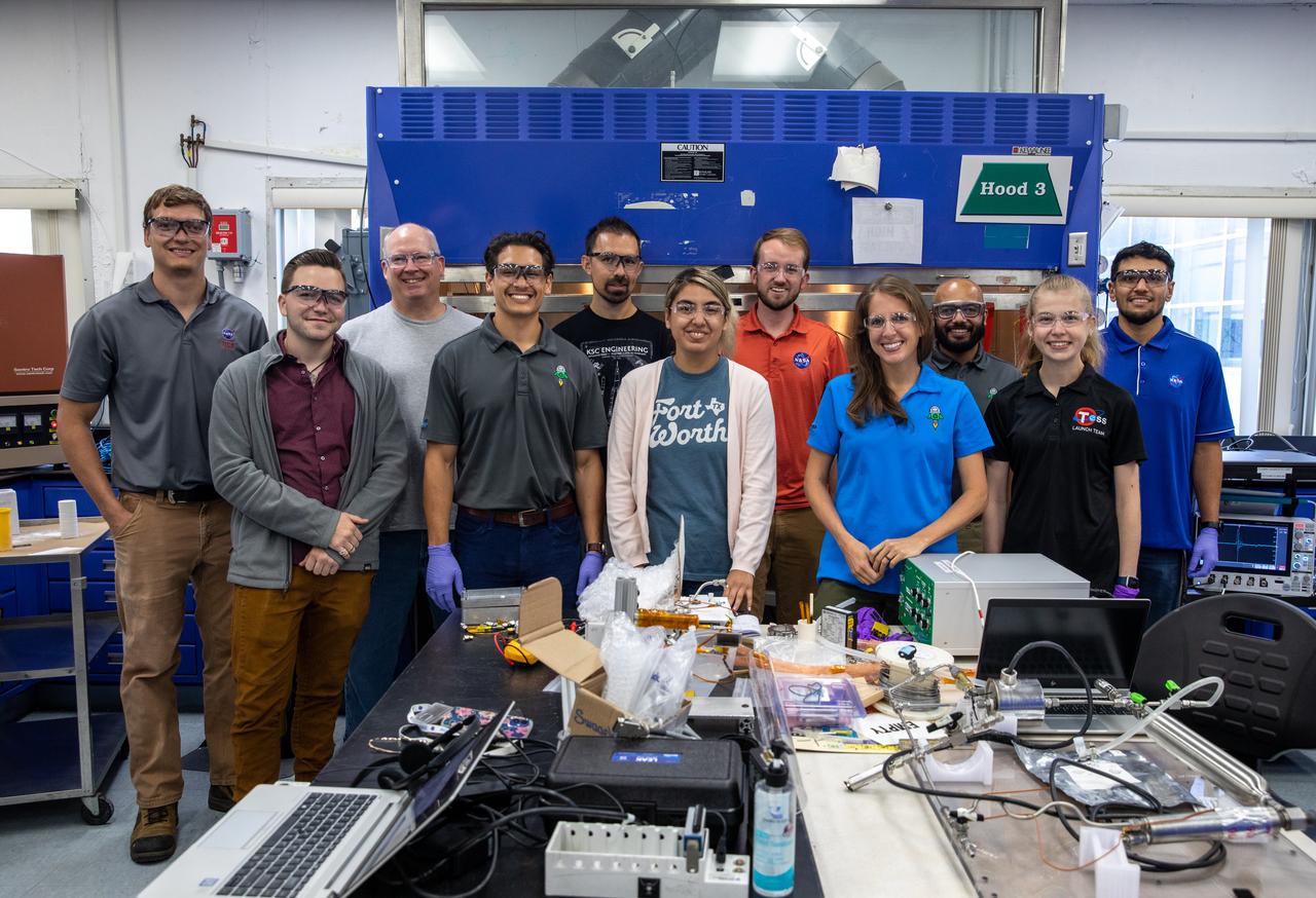The In-Situ Resource Reutilization team gathers inside the Applied Physics Lab in the Neil Armstrong Operations and Checkout Facility at the agency’s Kennedy Space Center in Florida on July 21, 2022.