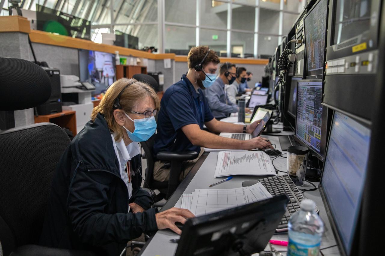 Artemis teams conduct the final simulation for the Artemis I mission inside the Launch Control Center at NASA’s Kennedy Space Center in Florida on Aug. 4, 2022. Artemis I will be the first integrated test of NASA’s Space Launch System (SLS) rocket and Orion spacecraft. During the flight, Orion will launch atop the most powerful rocket in the world and fly farther than any spacecraft for humans has ever flown. The spacecraft will stay in space longer than any human spacecraft has without docking to the International Space Station and return home faster than ever before. Shown here is Teresa Annulis, assistant SLS test conductor.