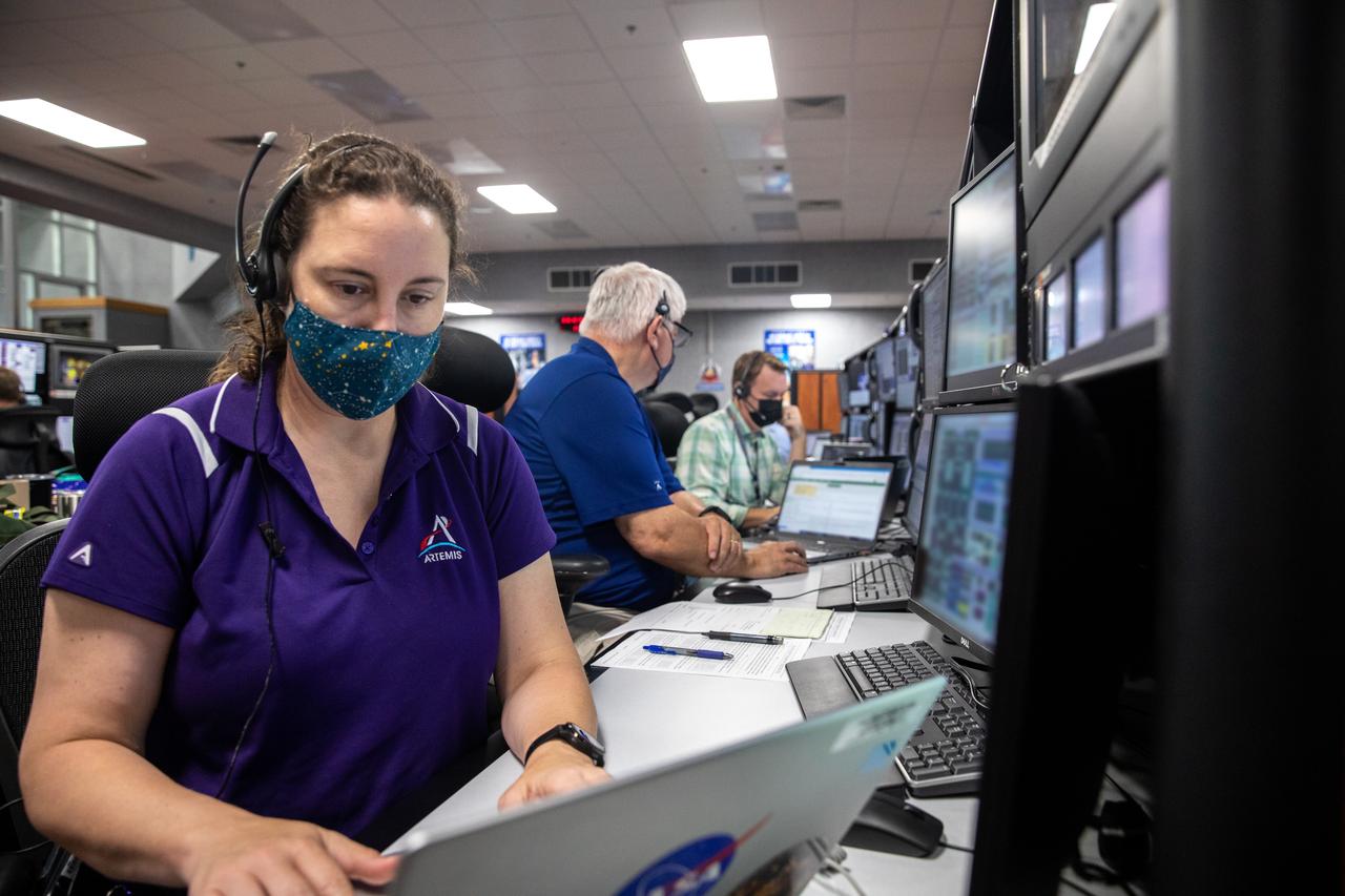 Artemis teams conduct the final simulation for the Artemis I mission inside the Launch Control Center at NASA’s Kennedy Space Center in Florida on Aug. 4, 2022. Artemis I will be the first integrated test of NASA’s Space Launch System (SLS) rocket and Orion spacecraft. During the flight, Orion will launch atop the most powerful rocket in the world and fly farther than any spacecraft for humans has ever flown. The spacecraft will stay in space longer than any human spacecraft has without docking to the International Space Station and return home faster than ever before.