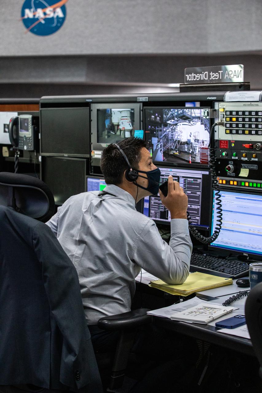 Artemis teams conduct the final simulation for the Artemis I mission inside the Launch Control Center at NASA’s Kennedy Space Center in Florida on Aug. 4, 2022. Artemis I will be the first integrated test of NASA’s Space Launch System (SLS) rocket and Orion spacecraft. During the flight, Orion will launch atop the most powerful rocket in the world and fly farther than any spacecraft for humans has ever flown. The spacecraft will stay in space longer than any human spacecraft has without docking to the International Space Station and return home faster than ever before. Shown here is Daniel Florez, NASA test director.