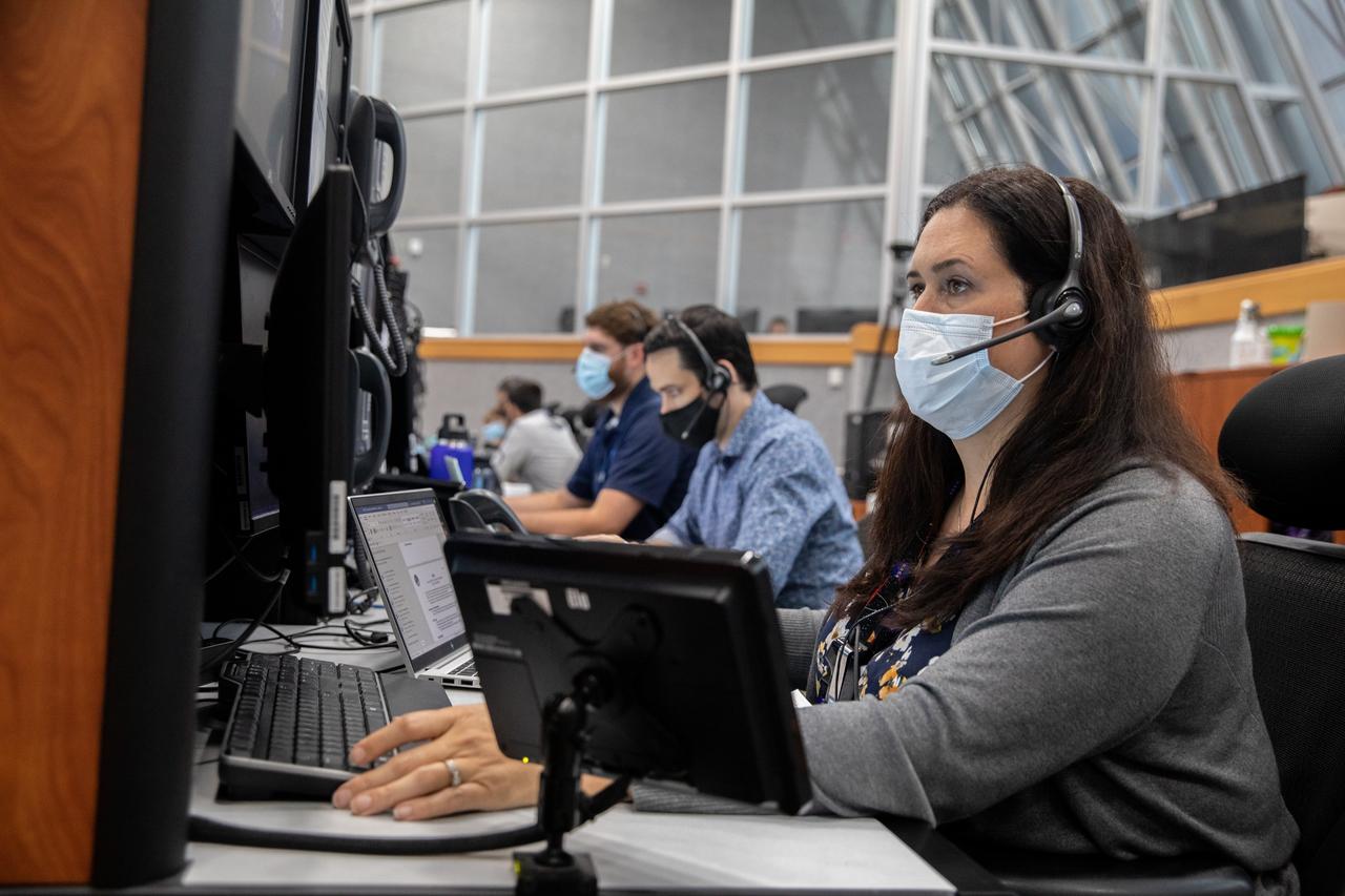 Artemis teams conduct the final simulation for the Artemis I mission inside the Launch Control Center at NASA’s Kennedy Space Center in Florida on Aug. 4, 2022. Artemis I will be the first integrated test of NASA’s Space Launch System (SLS) rocket and Orion spacecraft. During the flight, Orion will launch atop the most powerful rocket in the world and fly farther than any spacecraft for humans has ever flown. The spacecraft will stay in space longer than any human spacecraft has without docking to the International Space Station and return home faster than ever before. Shown here is Melissa Jones, Artemis I landing and recovery director.
