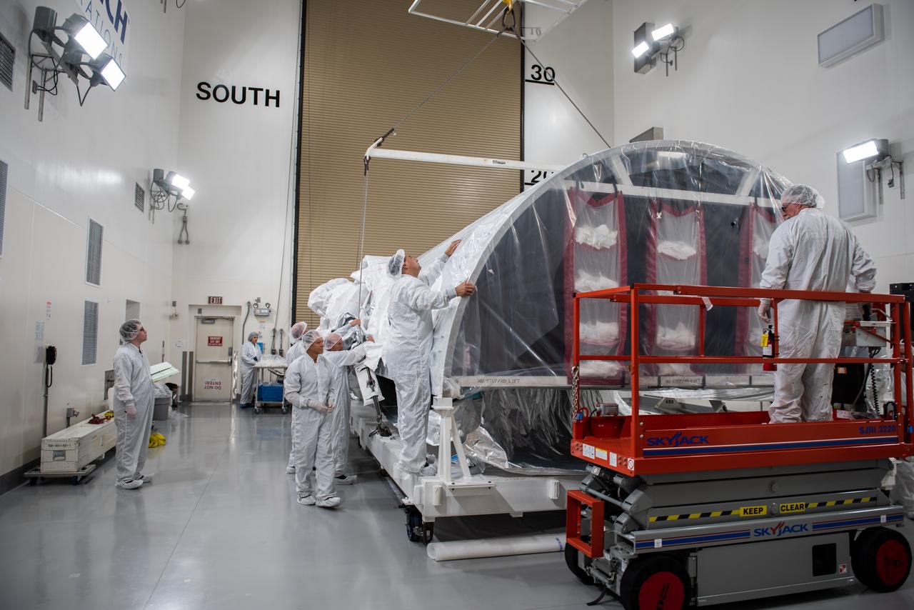 The United Launch Alliance (ULA) Atlas V payload fairing is transported from Building 7525 to the Astrotech Processing Facility at Vandenberg Space Force Base (VSFB) in California on Aug. 10, 2022, for NASA and the National Oceanic and Atmospheric Administration’s (NOAA) Joint Polar Satellite System-2 (JPSS-2) satellite mission. JPSS-2 is the third satellite in the Joint Polar Satellite System series. It is scheduled to lift off from VSFB on Nov. 1 from Space Launch Complex-3. JPSS-2, which will be renamed NOAA-21 after reaching orbit, will join a constellation of JPSS satellites that orbit from the North to the South pole, circling Earth 14 times a day and providing a full view of the entire globe twice daily. The NOAA/NASA Suomi National Polar-orbiting Partnership (Suomi NPP) satellite, and NOAA-20, previously known as JPSS-1, are both already in orbit. Each satellite carries at least four advanced instruments to measure weather and climate conditions on Earth. Launching as a secondary payload to JPSS-2 is NASA’s Low-Earth Orbit Flight Test of an Inflatable Decelerator (LOFTID), dedicated to the memory of Bernard Kutter. LOFTID will demonstrate inflatable heat shield technology that could enable a variety of proposed NASA missions to destinations such as Mars, Venus, and Titan, as well as returning heavier payloads from low-Earth orbit. 