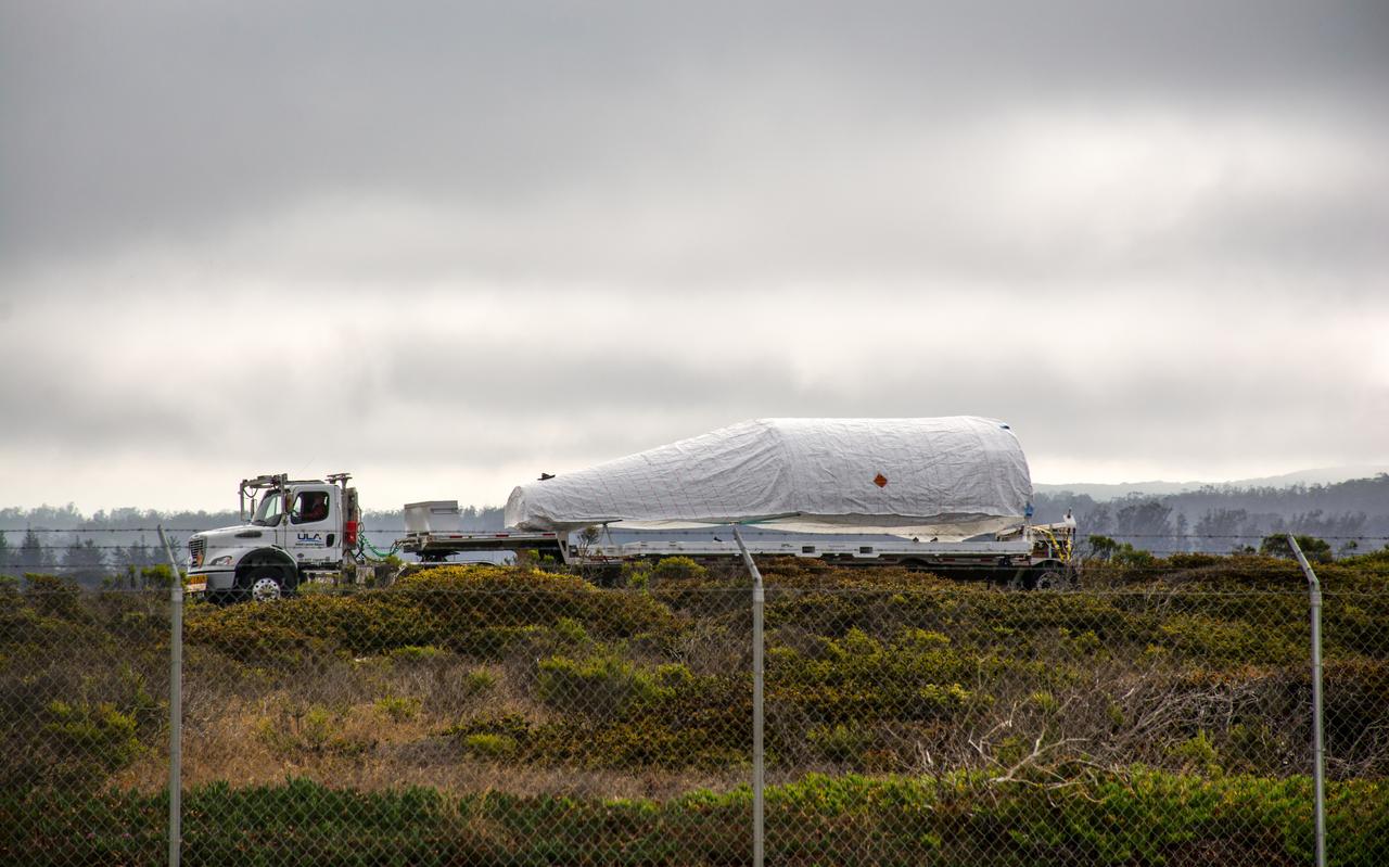The United Launch Alliance (ULA) Atlas V payload fairing transits from Building 7525 to the Astrotech Processing Facility at Vandenberg Space Force Base (VSFB) in California on Aug. 10, 2022, for NASA and the National Oceanic and Atmospheric Administration’s (NOAA) Joint Polar Satellite System-2 (JPSS-2) satellite mission. JPSS-2 is the third satellite in the Joint Polar Satellite System series. It is scheduled to lift off from VSFB on Nov. 1 from Space Launch Complex-3. JPSS-2, which will be renamed NOAA-21 after reaching orbit, will join a constellation of JPSS satellites that orbit from the North to the South pole, circling Earth 14 times a day and providing a full view of the entire globe twice daily. The NOAA/NASA Suomi National Polar-orbiting Partnership (Suomi NPP) satellite, and NOAA-20, previously known as JPSS-1, are both already in orbit. Each satellite carries at least four advanced instruments to measure weather and climate conditions on Earth. Launching as a secondary payload to JPSS-2 is NASA’s Low-Earth Orbit Flight Test of an Inflatable Decelerator (LOFTID), dedicated to the memory of Bernard Kutter. LOFTID will demonstrate inflatable heat shield technology that could enable a variety of proposed NASA missions to destinations such as Mars, Venus, and Titan, as well as returning heavier payloads from low-Earth orbit. 