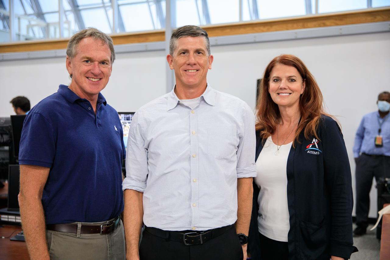 From left, NASA’s Exploration Ground Systems Manager Mike Bolger, Artemis I Assistant Launch Director Jeremy Graeber, and Launch Director Charlie Blackwell-Thompson are photographed inside Firing Room 2 of the Rocco A. Petrone Launch Control Center at the agency’s Kennedy Space Center in Florida during a certification ceremony on Aug. 12, 2022. The ceremony was held to commemorate the certification of the Artemis I launch team following their launch simulation held in December 2021. During the ceremony, Bolger, Graeber, and Blackwell-Thompson handed out certificates to individual members of the launch team. The first in an increasingly complex series of missions, Artemis I will test NASA’s Space Launch System rocket and Orion spacecraft as an integrated system prior to crewed flights to the Moon. Through Artemis, NASA will land the first woman and the first person of color on the lunar surface, paving the way for long-term lunar presence and using the Moon as a steppingstone before venturing to Mars.