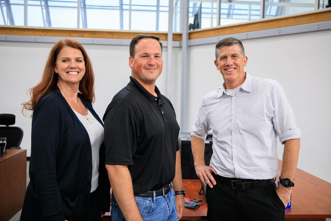 From left, Artemis I Launch Director Charlie Blackwell-Thompson, Technical Assistant to the Launch Director Wes Mosedale, and Assistant Launch Director Jeremy Graeber are photographed inside Firing Room 2 of the Rocco A. Petrone Launch Control Center at the agency’s Kennedy Space Center in Florida during a certification ceremony on Aug. 12, 2022. The ceremony was held to commemorate the certification of the Artemis I launch team following their launch simulation held in December 2021. During the ceremony, management staff handed out certificates to individual team members. The first in an increasingly complex series of missions, Artemis I will test NASA’s Space Launch System rocket and Orion spacecraft as an integrated system prior to crewed flights to the Moon. Through Artemis, NASA will land the first woman and the first person of color on the lunar surface, paving the way for long-term lunar presence and using the Moon as a steppingstone before venturing to Mars.