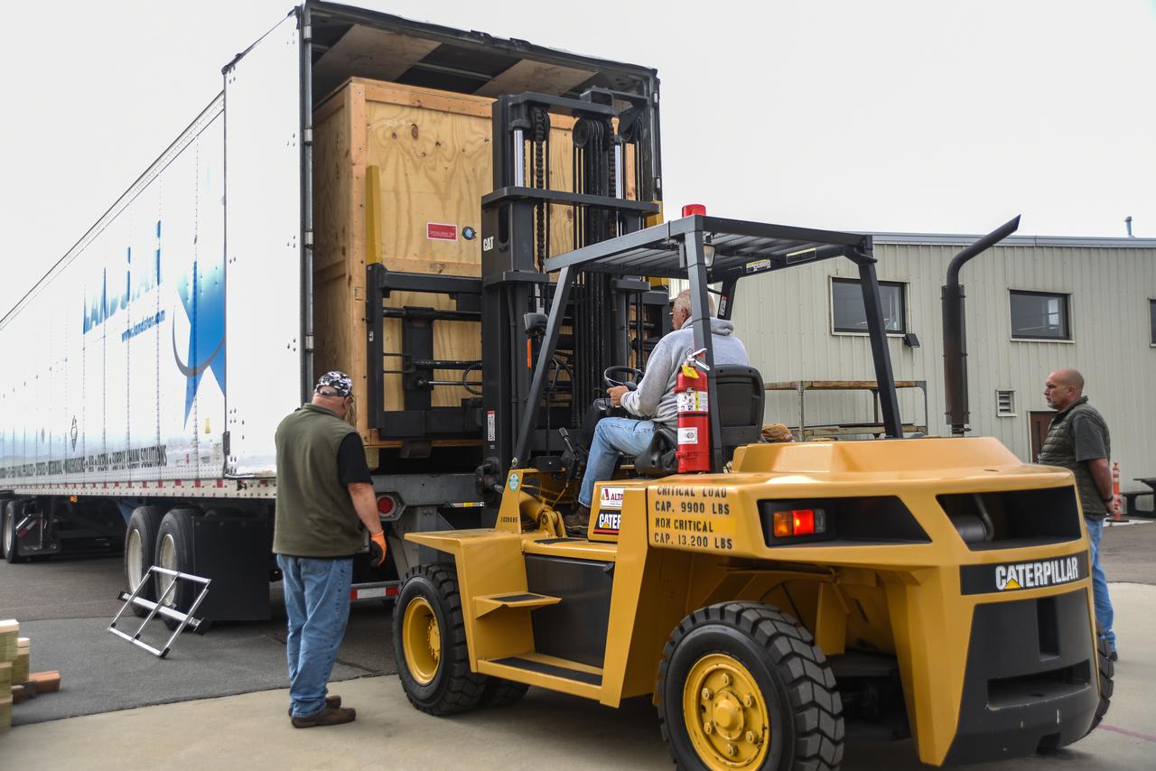 NASA’s Low-Earth Orbit Flight Test of an Inflatable Decelerator, or LOFTID, arrives by cargo truck at Vandenberg Space Force Base in California on Aug. 15, 2022. The technology demonstration mission will demonstrate inflatable heat shield technology that uses aerodynamic drag to slow down spacecraft in the most mass-efficient way. This technology could enable a variety of proposed NASA missions to destinations such as Mars, Venus, and Titan, as well as returning heavier payloads from low-Earth orbit. LOFTID is a rideshare launching with the National Oceanic and Atmospheric Administration’s (NOAA) Joint Polar Satellite System-2 (JPSS-2) satellite. NASA and NOAA are targeting Nov. 1 for the JPSS-2 launch on a United Launch Alliance (ULA) Atlas V 401 rocket from Space Launch Complex-3 at Vandenberg Space Force Base. 