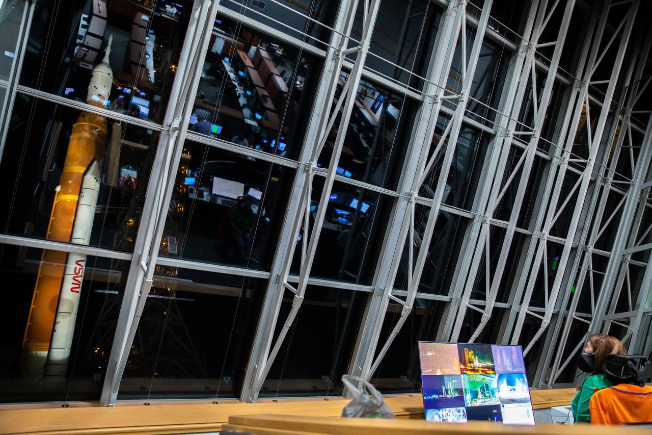NASA Launch Director Charlie Blackwell-Thompson watches the agency’s Space Launch System (SLS) rocket with the Orion spacecraft atop a mobile launcher through the windows of Firing Room 1 in the Rocco A. Petrone Launch Control Center as it rolls out of High Bay 3 of the Vehicle Assembly Building to Launch Complex 39B, on Tuesday, Aug. 16, 2022, ahead of the agency’s Artemis I flight test. The fully stacked and integrated SLS rocket and Orion spacecraft is scheduled to liftoff on Monday, Aug. 29. The first in a series of increasingly complex missions, Artemis I will provide a foundation for human deep space exploration and demonstrate our commitment and capability to extend human presence to the Moon and beyond. The primary goal of Artemis I is to thoroughly test the integrated systems before crewed missions by launching Orion atop the SLS rocket, operating the spacecraft in a deep space environment, testing Orion’s heat shield, and recovering the crew module after reentry, descent, and splashdown. In later missions, NASA will land the first woman and the first person of color on the surface of the Moon, paving the way for a long-term lunar presence and serving as a steppingstone on the way to Mars.