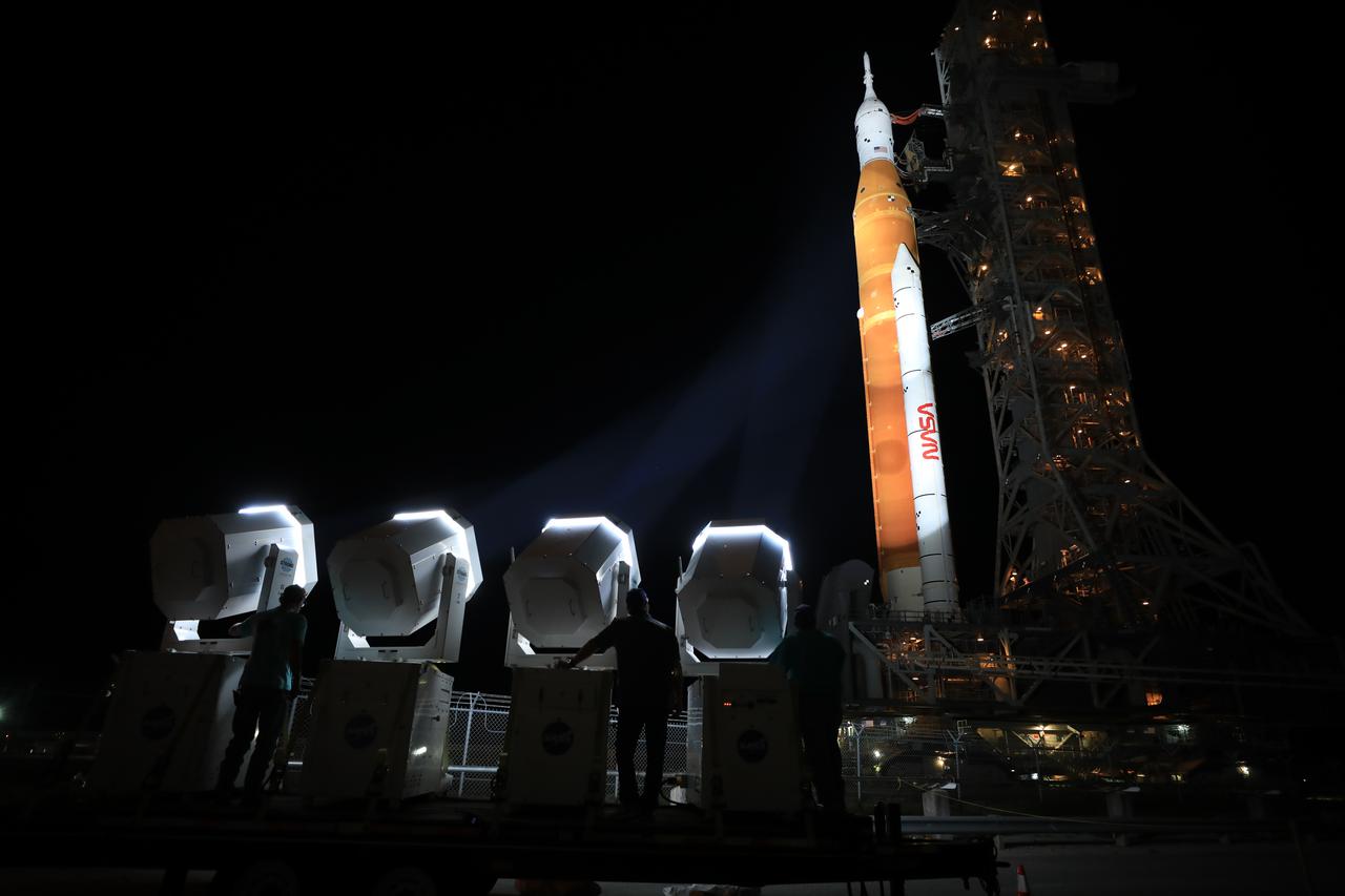NASA’s Space Launch System (SLS) rocket, with the Orion capsule atop, slowly makes its way along the crawlerway at the agency’s Kennedy Space Center in Florida on Tuesday, Aug. 16, 2022/Wednesday, Aug. 17, 2022. Carried atop the crawler-transporter 2, NASA’s Moon rocket is venturing the 4.2 miles from the Vehicle Assembly Building to Launch Complex 39B ahead of the first flight test of the fully stacked and integrated SLS rocket and Orion spacecraft, scheduled to liftoff on Monday, Aug. 29. The first in a series of increasingly complex missions, Artemis I will provide a foundation for human deep space exploration and demonstrate our commitment and capability to extend human presence to the Moon and beyond. The primary goal of Artemis I is to thoroughly test the integrated systems before crewed missions by launching Orion atop the SLS rocket, operating the spacecraft in a deep space environment, testing Orion’s heat shield, and recovering the crew module after reentry, descent, and splashdown. In later missions, NASA will land the first woman and the first person of color on the surface of the Moon, paving the way for a long-term lunar presence and serving as a steppingstone on the way to Mars.