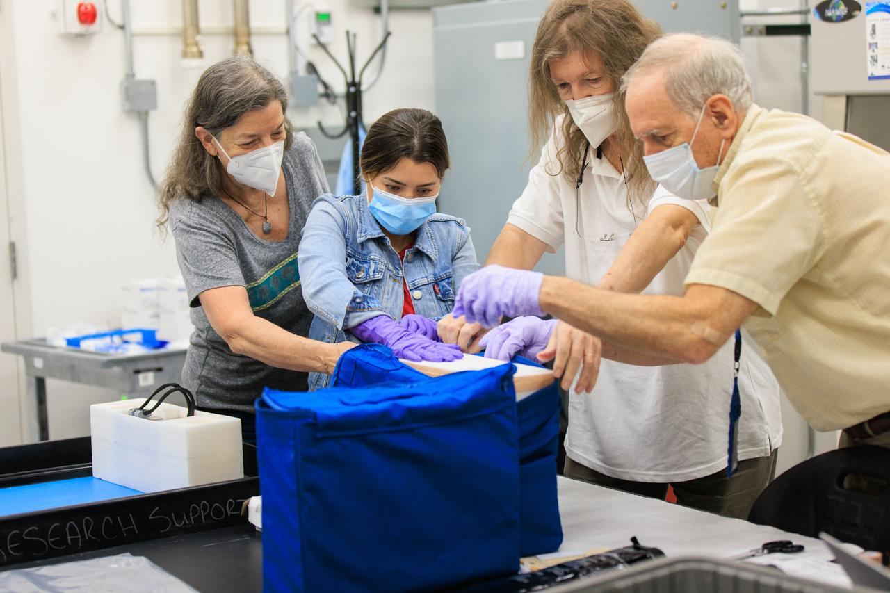 Scientists package up part of NASA’s Biology Experiment-1 (BioExpt-1) for official handover to the Orion team for Artemis I inside the Space Station Processing Facility at the agency’s Kennedy Space Center in Florida on Aug. 18, 2022. BioExpt-1 is a space biology pathfinder, which will carry Arabidopsis, algae, yeast, and fungi science payloads for biology research beyond low-Earth orbit aboard the Orion capsule on the Artemis I mission. The payload container assemblies will be installed onto panels in the Orion capsule and will return to Earth to provide critical and unique data about life beyond low-Earth orbit for the first time in more than 40 years. Artemis I is the first in a series of increasingly complex missions that will enable human exploration to the Moon and eventually on to Mars.