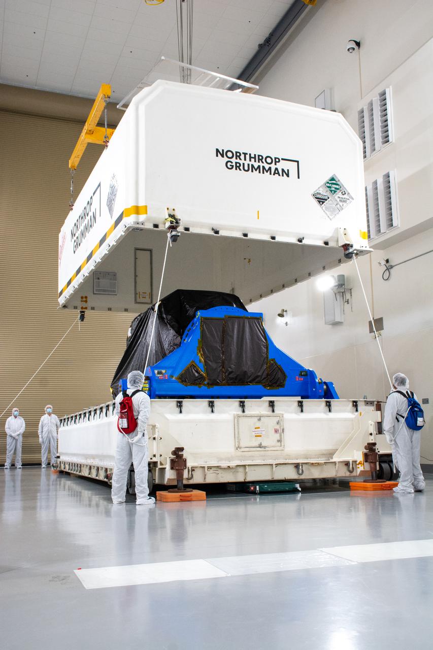 NASA and the National Oceanic and Atmospheric Association's Joint Polar Satellite System-2 (JPSS-2) satellite is removed from its shipping container inside the airlock of the Astrotech processing facility on Aug. 20, 2022, at Vandenberg Space Force Base (VSFB) in California. JPSS-2 was shipped from the Northrop Grumman facility in Gilbert, Arizona, where it was built and tested. JPSS-2 is the third satellite in the Joint Polar Satellite System series. It is scheduled to lift off from VSFB on Nov. 1 from Space Launch Complex-3 East. JPSS-2 will scan the globe as it orbits from the North to the South Pole, crossing the equator 14 times a day. From 512 miles above Earth, it will capture data that inform weather forecasts, extreme weather events, and climate change. The Visible Infrared Radiometer Suite instrument will collect imagery for global observations of the land, atmosphere, cryosphere, and oceans. Launching as a secondary payload to JPSS-2 is NASA’s Low-Earth Orbit Flight Test of an Inflatable Decelerator (LOFTID), dedicated to the memory of Bernard Kutter. LOFTID is a demonstration of a hypersonic inflatable aerodynamic decelerator, or aeroshell, technology that could one day help land humans on Mars.