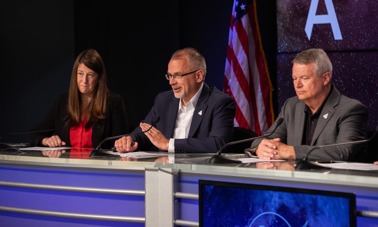 NASA holds a prelaunch media briefing on the role of industry in advancing human exploration on Aug. 26, 2022, at NASA’s Kennedy Space Center in Florida, as the agency prepares for launch of Artemis I scheduled for Aug. 29, at 8:33 a.m. EDT from Kennedy’s Launch Complex 39B. Participants, from left are Kathryn Hambleton, NASA Communications; Jim Free, association administrator, Exploration Systems Development Mission Directorate, NASA Headquarters; and Randy Lycans, vice president/general manager of NASA Enterprise Solutions, Jacobs. The first in a series of increasingly complex missions, Artemis I will provide a foundation for human deep space exploration and demonstrate our commitment and capability to extend human presence to the Moon and beyond. The primary goal of Artemis I is to thoroughly test the integrated systems before crewed missions by operating the spacecraft in a deep space environment, testing Orion’s heat shield, and recovering the crew module after reentry, descent, and splashdown. 