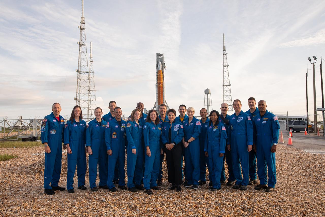 Astronauts and astronaut candidates from NASA and the Canadian Space Agency pose for a photograph in front of NASA’s Artemis I Space Launch System and Orion spacecraft atop the mobile launcher on the pad at Launch Complex 39B on Aug. 28, 2022. The astronauts are, from left to right: Randy Bresnik, NASA astronaut; Christina Birch, NASA astronaut candidate; Jessica Wittner, NASA astronaut candidate; Joshua Kutryk, Canadian Space Agency astronaut; Joe Acaba, NASA astronaut; Zena Cardman, NASA astronaut; Andre Douglas, NASA astronaut candidate; Shannon Walker, NASA astronaut; Reid Wiseman, NASA astronaut; Jessica Meir, NASA astronaut; Jack Hathaway, NASA astronaut candidate; Kate Rubins, NASA astronaut; Chris Williams, NASA astronaut candidate; Stephanie Wilson, NASA astronaut; Don Pettit, NASA astronaut; Stan Love, NASA astronaut; Jeremy Hansen, Canadian Space Agency astronaut; Victor Glover, NASA astronaut. Artemis I is scheduled to launch Aug. 29, at 8:33 a.m. EDT. The first in a series of increasingly complex missions, Artemis I will provide a foundation for human deep space exploration and demonstrate our commitment and capability to extend human presence to the Moon and beyond. The primary goal of Artemis I is to thoroughly test the integrated systems before crewed missions by operating the spacecraft in a deep space environment, testing Orion’s heat shield, and recovering the crew module after reentry, descent, and splashdown.