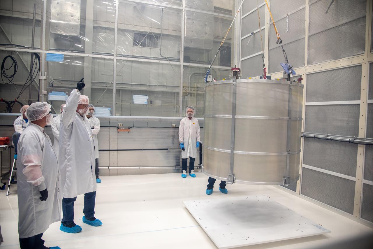 Technicians use a crane to lift the payload adapter separation systems canister for the Low-Earth Orbit Flight Test of an Inflatable Decelerator (LOFTID) as part of launch preparations inside Building 836 at Vandenberg Space Force Base (VSFB) in California on Sept. 1, 2022. The separation system canister loads into the payload adapter canister. The canister will go over the reentry vehicle.. LOFTID is the secondary payload on NASA and the National Oceanic and Atmospheric Administration’s (NOAA) Joint Polar Satellite System-2 (JPSS-2) satellite mission. JPSS-2 is the third satellite in the Joint Polar Satellite System series. It is scheduled to lift off from VSFB on Nov. 1 from Space Launch Complex-3. JPSS-2, which will be renamed NOAA-21 after reaching orbit, will join a constellation of JPSS satellites that orbit from the North to the South pole, circling Earth 14 times a day and providing a full view of the entire globe twice daily. The LOFTID is dedicated to the memory of Bernard Kutter. LOFTID will demonstrate inflatable heat shield technology that could enable a variety of proposed NASA missions to destinations such as Mars, Venus, and Titan, as well as returning heavier payloads from low-Earth orbit. 