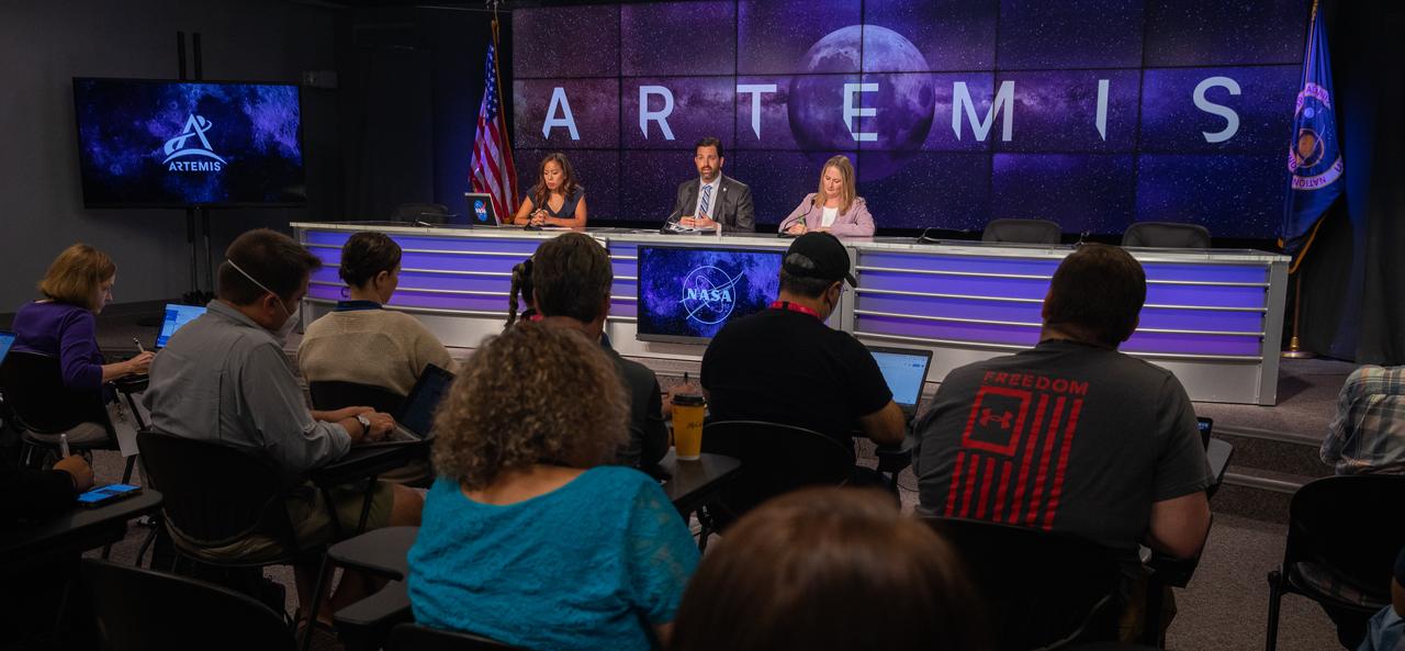 NASA holds a prelaunch media briefing on the status of the Artemis I countdown on Sept. 2, 2022, at NASA’s Kennedy Space Center in Florida. Participants are, from left, Megan Cruz, moderator, NASA Communications; Jeremy Parsons, Exploration Ground Systems, deputy program manager, NASA Kennedy; and Melody Lovin, weather officer, Space Launch Delta 45. Artemis I is scheduled to launch at 2:17 p.m. EDT on Sept. 3, from Kennedy’s Launch Complex 39B. Launch was waved off on Aug. 29 due to an issue during tanking. The first in a series of increasingly complex missions, Artemis I will provide a foundation for human deep space exploration and demonstrate NASA’s capability to extend human presence to the Moon and beyond. The primary goal of Artemis I is to thoroughly test the integrated systems before crewed missions by operating the spacecraft in a deep space environment, testing Orion’s heat shield, and recovering the crew module after reentry, descent, and splashdown. 