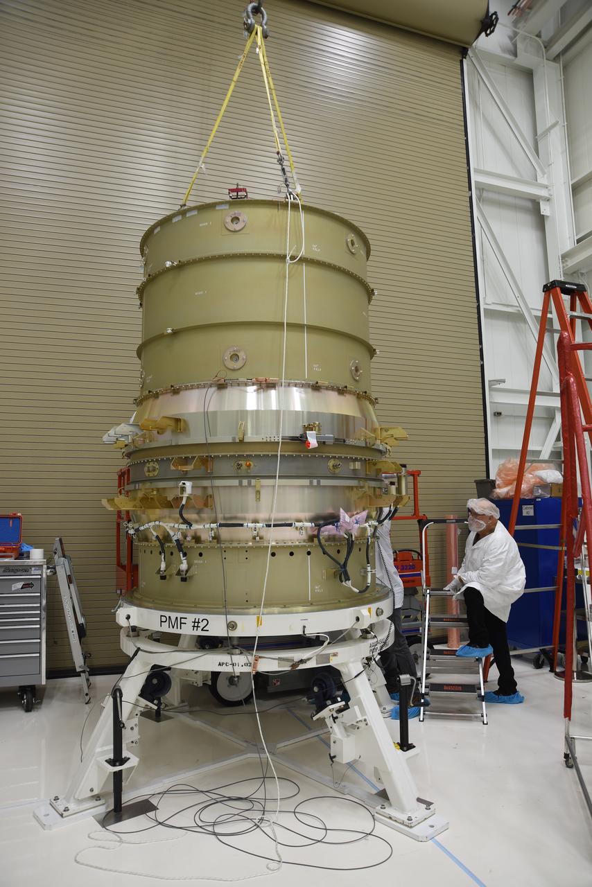 Technicians secure the re-entry vehicle payload adapter canister for the Low-Earth Orbit Flight Test of an Inflatable Decelerator (LOFTID) onto the payload adapter separation systems canister as part of launch preparations occurring inside Building 836 at Vandenberg Space Force Base (VSFB) in California on Sept. 8, 2022. LOFTID is the secondary payload on NASA and the National Oceanic and Atmospheric Administration’s (NOAA) Joint Polar Satellite System-2 (JPSS-2) satellite mission. JPSS-2 is the third satellite in the Joint Polar Satellite System series. It is scheduled to lift off from VSFB on Nov. 1 from Space Launch Complex-3. JPSS-2, which will be renamed NOAA-21 after reaching orbit, will join a constellation of JPSS satellites that orbit from the North to the South pole, circling Earth 14 times a day and providing a full view of the entire globe twice daily. 