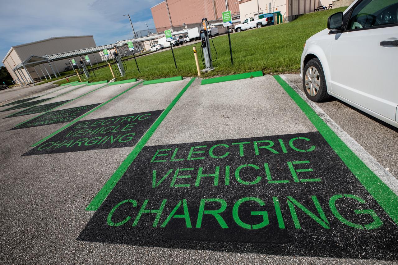 Several newly installed electric vehicle (EV) charging stations are in view near the Neil Armstrong Operations and Checkout Building at NASA’s Kennedy Space Center in Florida on Sept. 14, 2022. Part of a partnership between Kennedy and Florida Power & Light (FPL) to bring 23 EV charging stations to the spaceport, the ChargePoint CT4000, Level 2 chargers are capable of charging electric vehicles at a rate of 15-30 miles of range per hour. This partnership was set up under FPL’s EV program and provides a charging infrastructure that includes a simple way for businesses and employees to pay for usage. 