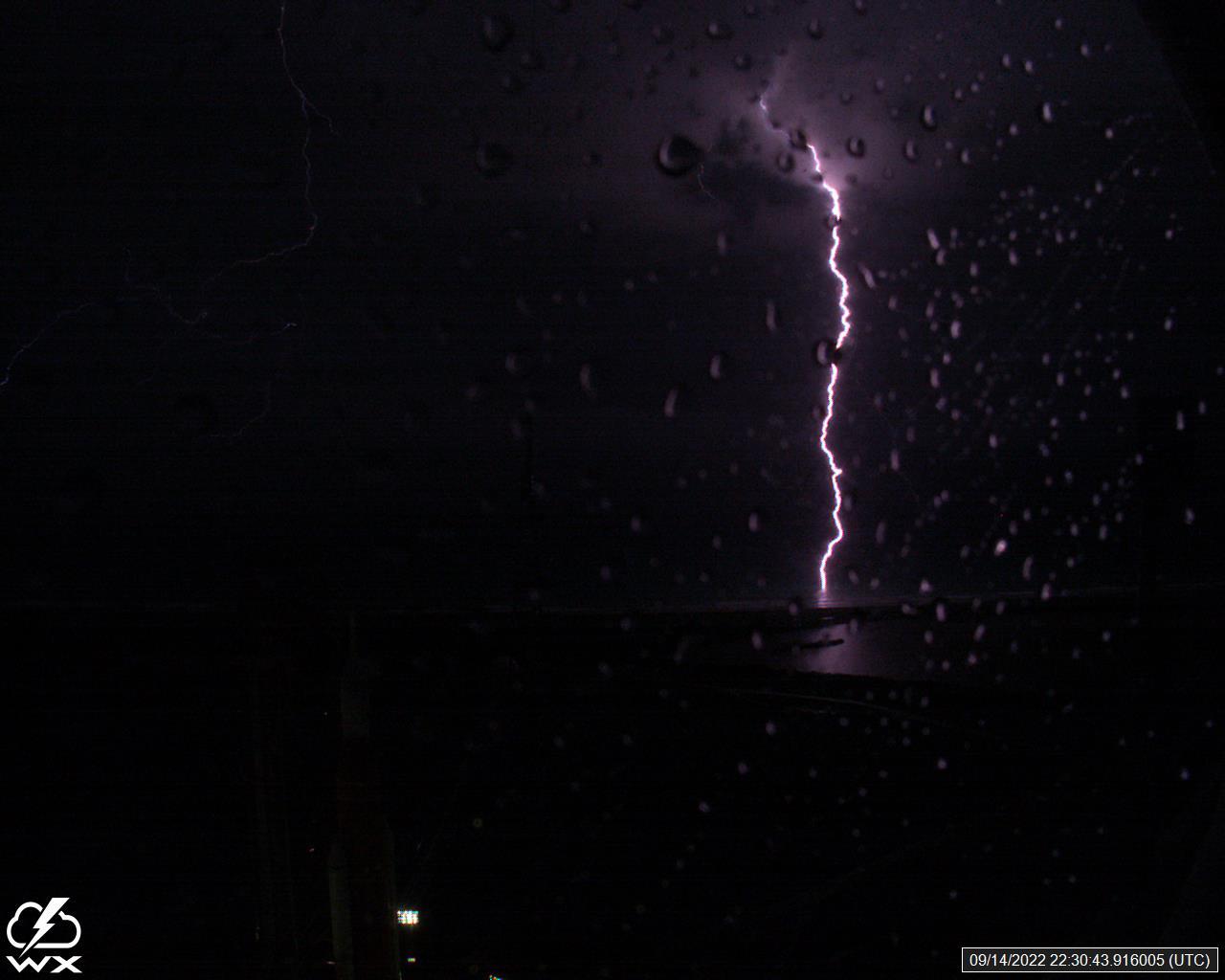 A lightning strike was recorded at Launch Complex 39B at NASA’s Kennedy Space Center in Florida on Sept. 14, 2022. NASA’s Space Launch System (SLS) and Orion spacecraft atop the mobile launcher are on the launch pad in preparation for the Artemis I mission. The lightning strike was recorded by cameras stationed at the pad and mobile launcher using a special filter called a “clear day frame,” which provides an overlay of the raw frame on a reference image. Artemis I will be the first integrated test of the SLS and Orion spacecraft. In later missions, NASA will land the first woman and the first woman of color on the surface of the Moon, paving the way for a long-term lunar presence and serving as a steppingstone on the way to Mars. 