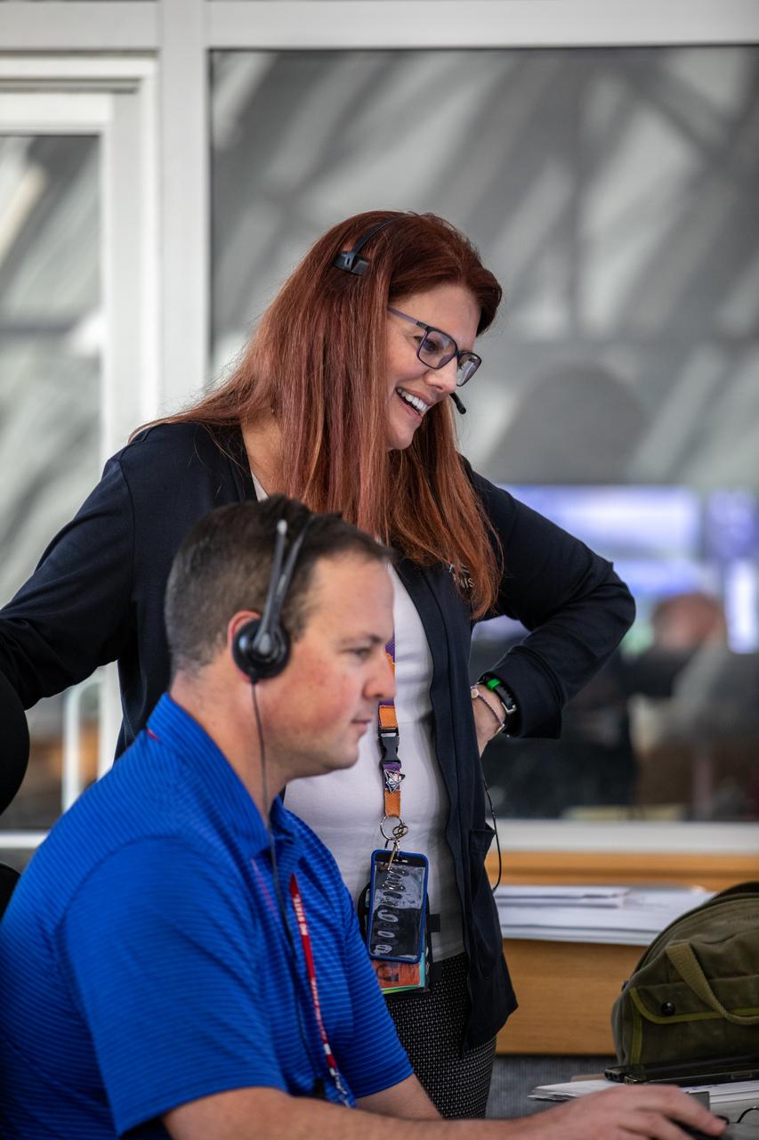 Artemis I Launch Director Charlie Blackwell-Thompson, standing, leads a cryogenic propellant tanking demonstration inside Firing Room 1 of the Rocco A. Petrone Launch Control Center at NASA’s Kennedy Space Center in Florida on Sept. 21, 2022. Seated at his console is Wes Mosedale, technical assistant to the launch director. The first in a series of increasingly complex missions, Artemis I will provide a foundation for human deep space exploration and demonstrate our commitment and capability to extend human presence to the Moon and beyond. The primary goal of Artemis I is to thoroughly test the integrated systems before crewed missions by operating the spacecraft in a deep space environment, testing Orion’s heat shield, and recovering the crew module after reentry, descent, and splashdown. 