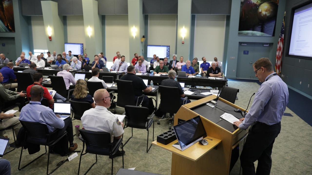 Artemis I team members conduct the Artemis I launch pre-test briefing on Sept. 23, 2022, at NASA’s Kennedy Space Center in Florida. The first in a series of increasingly complex missions, Artemis I will provide a foundation for human deep space exploration and demonstrate our commitment and capability to extend human presence to the Moon and beyond. The primary goal of Artemis I is to thoroughly test the integrated systems before crewed missions by operating the spacecraft in a deep space environment, testing Orion’s heat shield, and recovering the crew module after reentry, descent, and splashdown.