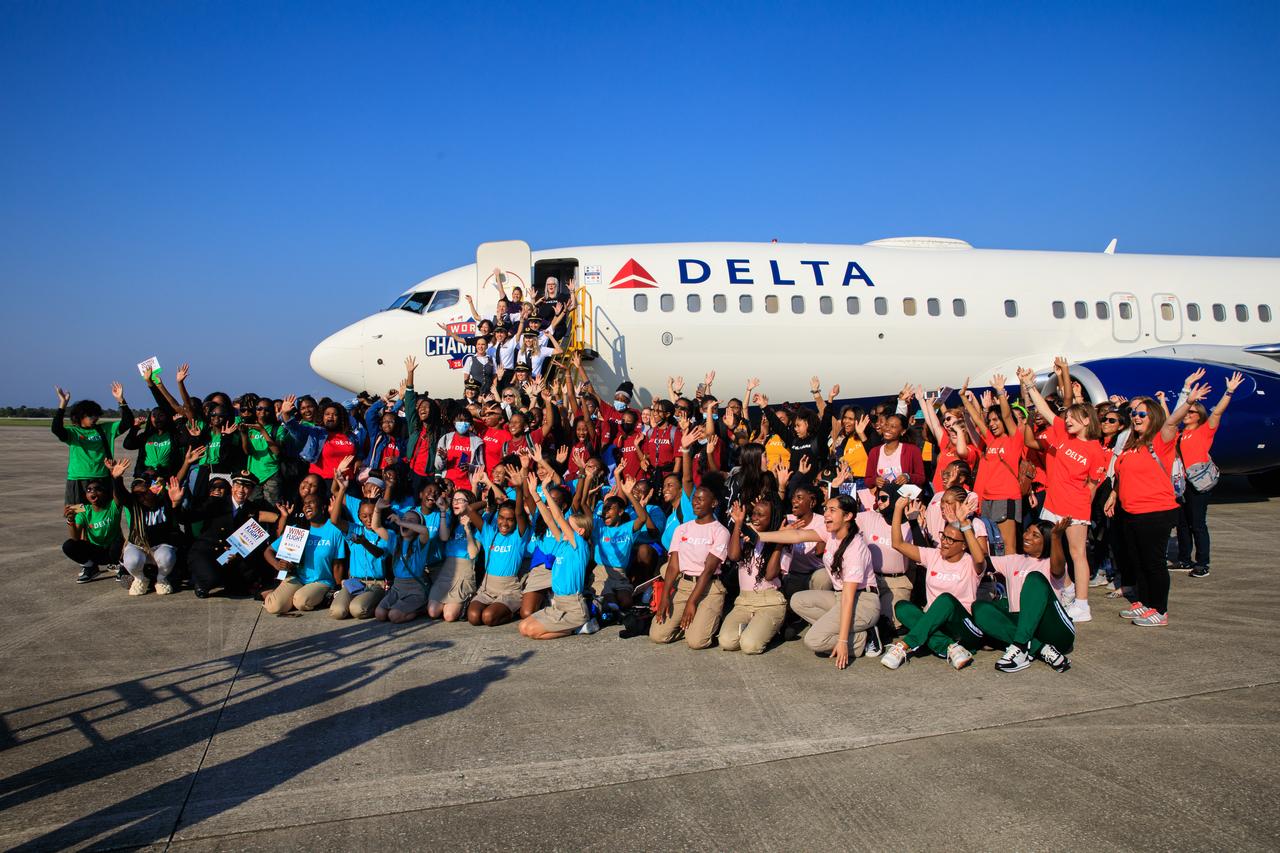 Students from various schools and organizations with a STEM (science, technology, engineering, math) focus are photographed at the Launch and Landing Facility following their arrival to the Kennedy Space Center on Sept. 23, 2022, as part of Delta Air Lines’ Women Inspiring Our Next Generation (WING) flight. The all-female flight crew brought girls from Atlanta, Georgia, ranging in age from 11 to 18, to learn about the various careers available at the Florida spaceport. While at Kennedy, the group had the opportunity to view NASA’s Artemis I Moon rocket at Launch Pad 39B, hear from a panel of 18 women with a combination of careers from Kennedy and Delta, and tour the visitor complex.