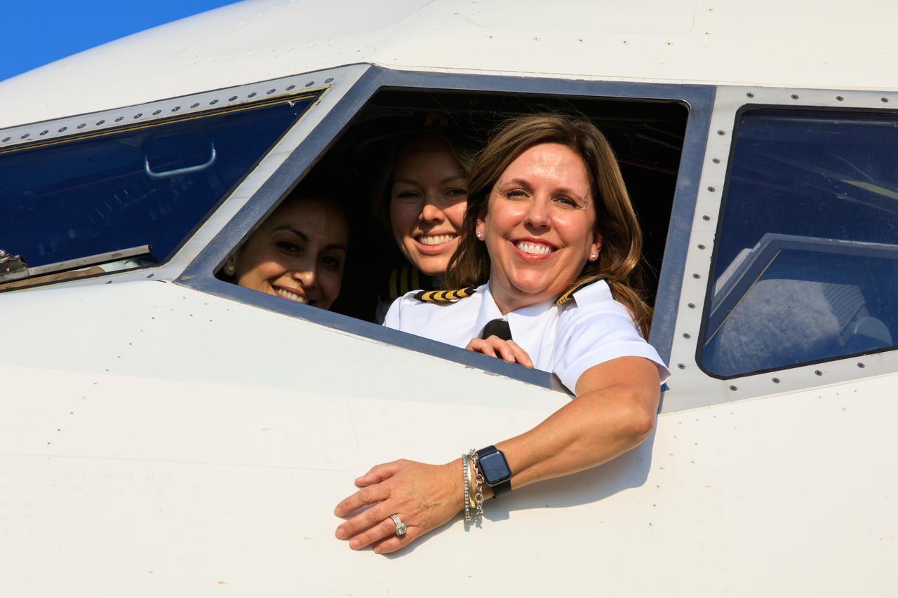 Part of the all-female crew for Delta Air Lines’ Women Inspiring Our Next Generation (WING) flight is photographed just after touching down at the Launch and Landing Facility at NASA’s Kennedy Space Center in Florida on Sept. 23, 2022. The flight brought girls from Atlanta, Georgia, ranging in age from 11 to 18, to learn about the various careers available at the Florida spaceport. While at Kennedy, the group had the opportunity to view NASA’s Artemis I Moon rocket at Launch Pad 39B, hear from a panel of 18 women with a combination of careers from Kennedy and Delta, and tour the visitor complex.