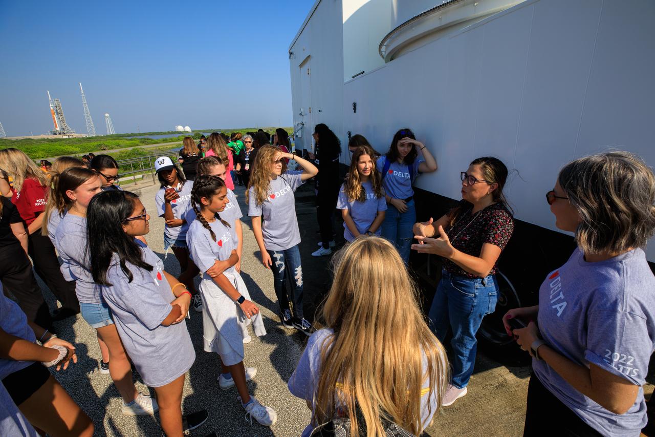 Liliana Villarreal (right), operations flow manager with NASA’s Exploration Ground Systems program, speaks to a group of students on a tour to see the agency’s Artemis I Moon rocket at Launch Pad 39B during their visit to Kennedy Space Center on Sept. 23, 2022. As part of Delta Air Lines’ Women Inspiring Our Next Generation (WING) program, an all-female crew flew girls from a variety of Atlanta, Georgia area schools and organizations with a STEM (science, technology, engineering, math) focus to Kennedy to learn about the various careers available at the Florida spaceport. While at Kennedy, the group also had the opportunity to hear from a panel of 18 women with a combination of careers from Kennedy and Delta and tour the visitor complex.