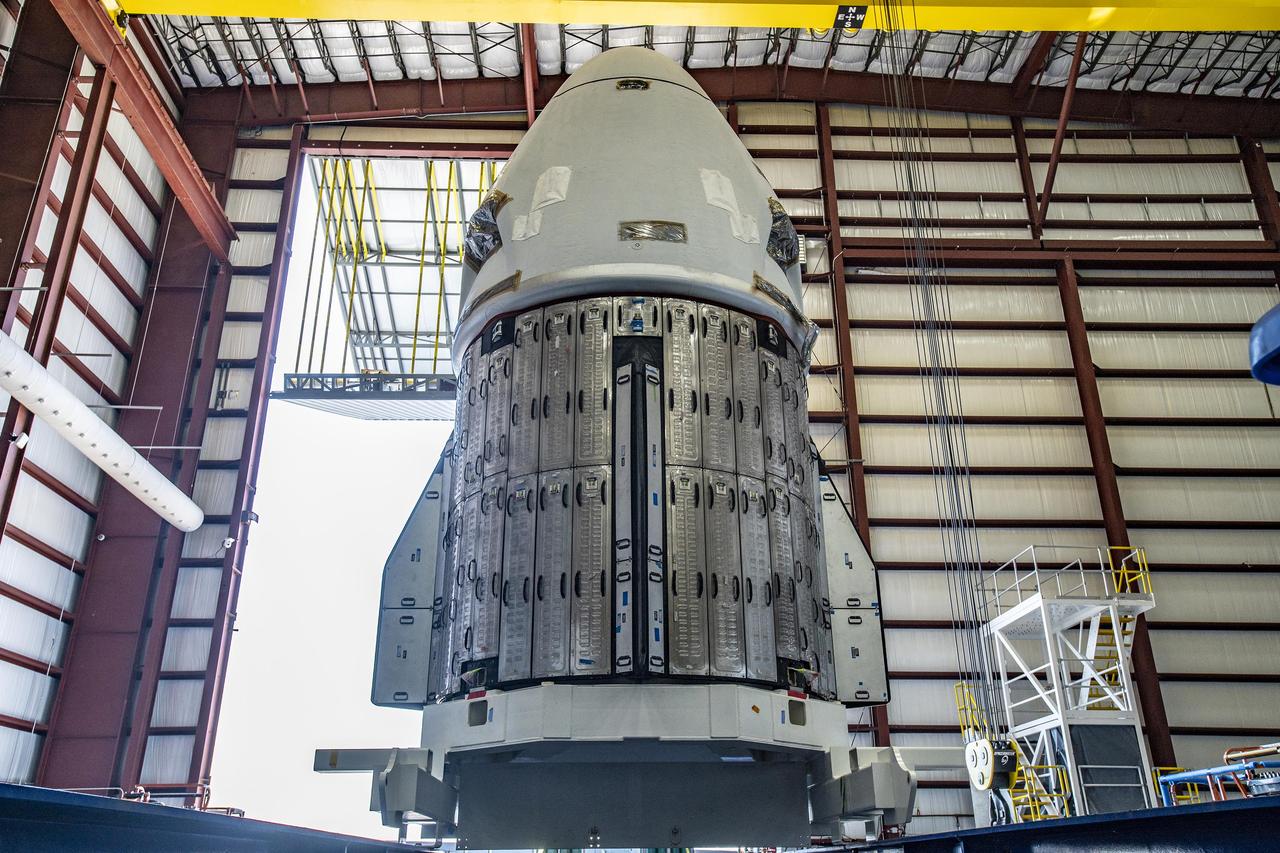 The Crew Dragon Endurance spacecraft for NASA’s SpaceX Crew-5 mission arrives at the hangar at Kennedy Space Center’s Launch Complex 39A in Florida on Sept. 23, 2022. The capsule arrived at the launch complex after making the short journey from its nearby processing facility at Cape Canaveral Space Force Station. NASA astronauts Nicole Aunapu Mann, commander; Josh Cassada, pilot; and mission specialists Koichi Wakata, of JAXA (Japan Aerospace Exploration Agency), and Roscosmos cosmonaut Anna Kikina will lift off aboard Endurance – on the company’s Falcon 9 rocket – from Launch Complex 39A at Kennedy. Liftoff is targeted for no earlier than 12:46 p.m. EDT Monday, Oct. 3.