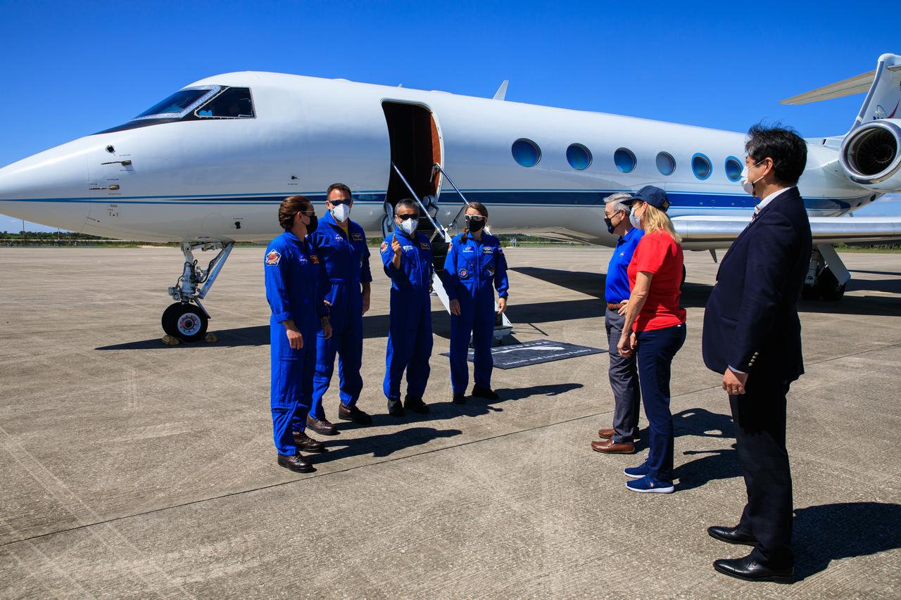 Crew members for NASA’s SpaceX Crew-5 mission to the International Space Station arrive at the Launch and Landing Facility at Kennedy Space Center in Florida on Oct. 1, 2022. From left are Nicole Mann, commander; Josh Cassada, pilot; Koichi Wakata, mission specialist; and Anna Kikina, mission specialist. Greeting the crew, from left, are Bob Cabana, NASA associate administrator; Janet Petro, Kennedy director; and Junichi Sakai, manager, International Space Station, JAXA. The crew will head to the center’s Crew Quarters as they await launch aboard the Crew Dragon on a SpaceX Falcon 9 rocket. Launch is targeted for noon EDT on Oct. 5 from Launch Complex 39A. Crew-5 is the fifth crew rotation mission with SpaceX to the station, and the sixth flight of Dragon with people as part of the agency’s Commercial Crew Program.