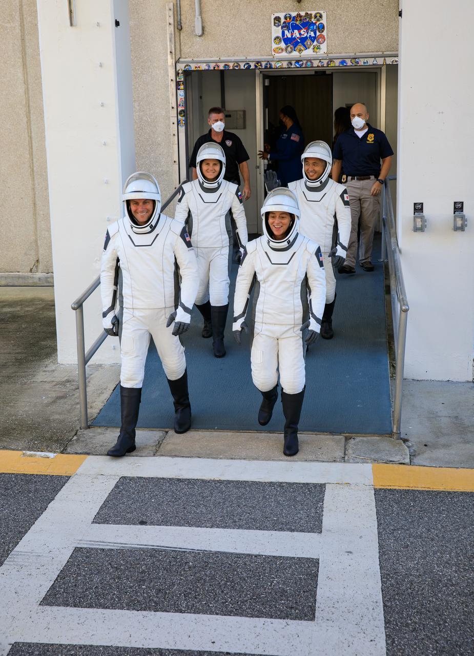 NASA’s SpaceX Crew-5 astronauts walk out of the Neil A. Armstrong Operations and Checkout Building at the agency’s Kennedy Space Center in Florida during a countdown dress rehearsal on Oct. 2, 2022, to prepare for the upcoming Crew-5 launch. In front are NASA astronauts Josh Cassada (left) and Nicole Aunapu Mann, and behind them are Roscosmos cosmonaut Anna Kikina (left) and JAXA (Japan Aerospace Exploration Agency) astronaut Koichi Wakata. The crew will launch to the International Space Station aboard SpaceX’s Crew Dragon Endurance spacecraft for a science expedition mission as part of NASA’s Commercial Crew Program. Liftoff of SpaceX’s Falcon 9 rocket is targeted for noon EDT on Oct. 5, 2022, from Kennedy’s Launch Complex 39A.