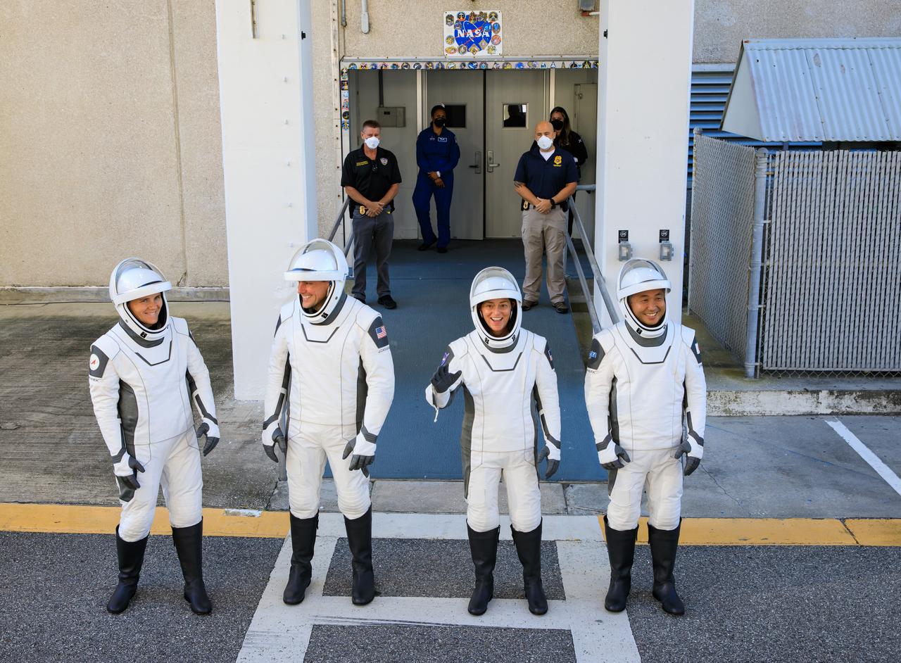 NASA’s SpaceX Crew-5 astronauts walk out of the Neil A. Armstrong Operations and Checkout Building at the agency’s Kennedy Space Center in Florida during a countdown dress rehearsal on Oct. 2, 2022, to prepare for the upcoming Crew-5 launch. From left are Roscosmos cosmonaut Anna Kikina, NASA astronauts Josh Cassada and Nicole Aunapu Mann, and JAXA (Japan Aerospace Exploration Agency) astronaut Koichi Wakata. The crew will launch to the International Space Station aboard SpaceX’s Crew Dragon Endurance spacecraft for a science expedition mission as part of NASA’s Commercial Crew Program. Liftoff of SpaceX’s Falcon 9 rocket is targeted for noon EDT on Oct. 5, 2022, from Kennedy’s Launch Complex 39A.
