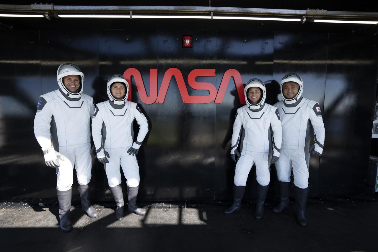NASA’s SpaceX Crew-5 astronauts are photographed in front of the agency’s iconic worm logo at Launch Complex 39A during a countdown dress rehearsal on Oct. 2, 2022, at NASA’s Kennedy Space Center in Florida. From left are NASA astronaut Josh Cassada, pilot; Roscosmos cosmonaut Anna Kikina, mission specialist; NASA astronaut Nicole Mann, commander; and JAXA (Japan Aerospace Exploration Agency) astronaut Koichi Wakata, mission specialist. The crew will launch to the International Space Station aboard SpaceX’s Dragon Endurance spacecraft for a science expedition mission as part of NASA’s Commercial Crew Program. Liftoff of SpaceX’s Falcon 9 rocket is targeted for noon EDT on Oct. 5, 2022, from Kennedy’s Launch Complex 39A.