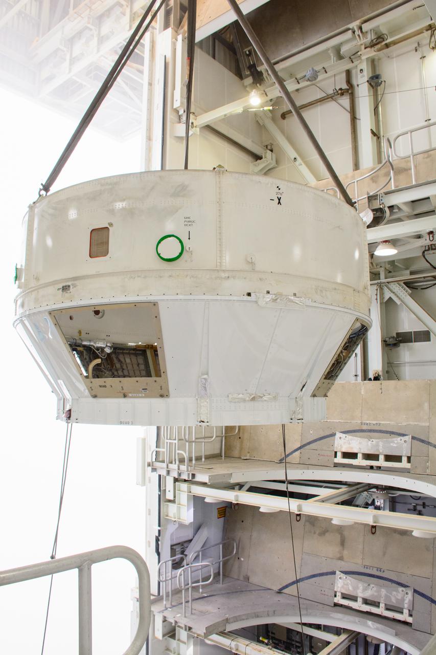 Technicians lower the United Launch Alliance (ULA) Atlas V boattail onto the rocket’s Centaur upper stage inside the Vertical Integration Facility at Vandenberg Space Force Base in California on Oct. 4, 2022, for the National Oceanic and Atmospheric Administration’s (NOAA) and NASA’s Joint Polar Satellite System-2 (JPSS-2) mission. The boattail is the connecting piece of flight hardware that joins that Atlas V upper stage with the payload fairing – the protective casing surrounding the JPSS-2 satellite. Once the payload fairing arrives at the VIF, teams will lower it onto the boattail to complete the Atlas V stack. JPSS-2 is the third satellite in the Joint Polar Satellite System series and will scan the Earth as it orbits from the North to the South Pole, crossing the equator 14 times a day. Operating from 512 miles above Earth, JPSS-2 will capture data to improve weather forecasts, in turn helping scientists predict and prepare for extreme weather events and climate change. Launching as a secondary payload to JPSS-2 is NASA’s Low-Earth Orbit Flight Test of an Inflatable Decelerator (LOFTID), dedicated to the memory of Bernard Kutter. LOFTID is a technology demonstration of an inflatable heat shield that could one day help land humans on Mars. Liftoff is targeted for 2:25 a.m. Pacific time (5:25 a.m. Eastern time) on Nov. 1, 2022, from Vandenberg’s Space Launch Complex-3E.