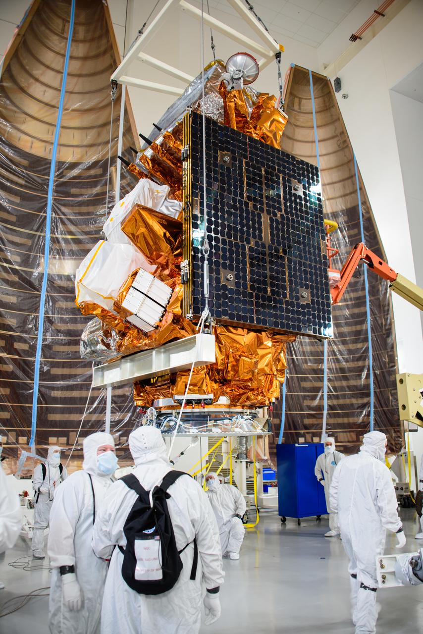 Technicians prepare the National Oceanic and Atmospheric Administration’s (NOAA) Joint Polar Satellite System-2 (JPSS-2) for stacking atop the Low-Earth Orbit Flight Test of an Inflatable Decelerator (LOFTID) payload inside the Astrotech Space Operations facility at Vandenberg Space Force Base (VSFB) in California on Oct. 5, 2022. JPSS-2 is the third satellite in the Joint Polar Satellite System series. It is scheduled to lift off from VSFB on Nov. 1 from Space Launch Complex-3. JPSS-2, which will be renamed NOAA-21 after reaching orbit, will join a constellation of JPSS satellites that orbit from the North to the South pole, circling Earth 14 times a day and providing a full view of the entire globe twice daily. The NOAA/NASA Suomi National Polar-orbiting Partnership (Suomi NPP) satellite, and NOAA-20, previously known as JPSS-1, are both already in orbit. Each satellite carries at least four advanced instruments to measure weather and climate conditions on Earth. LOFTID is a secondary payload on the mission. It is dedicated to the memory of Bernard Kutter. LOFTID will demonstrate inflatable heat shield technology that could enable a variety of proposed NASA missions to destinations such as Mars, Venus, and Titan, as well as returning heavier payloads from low-Earth orbit. 