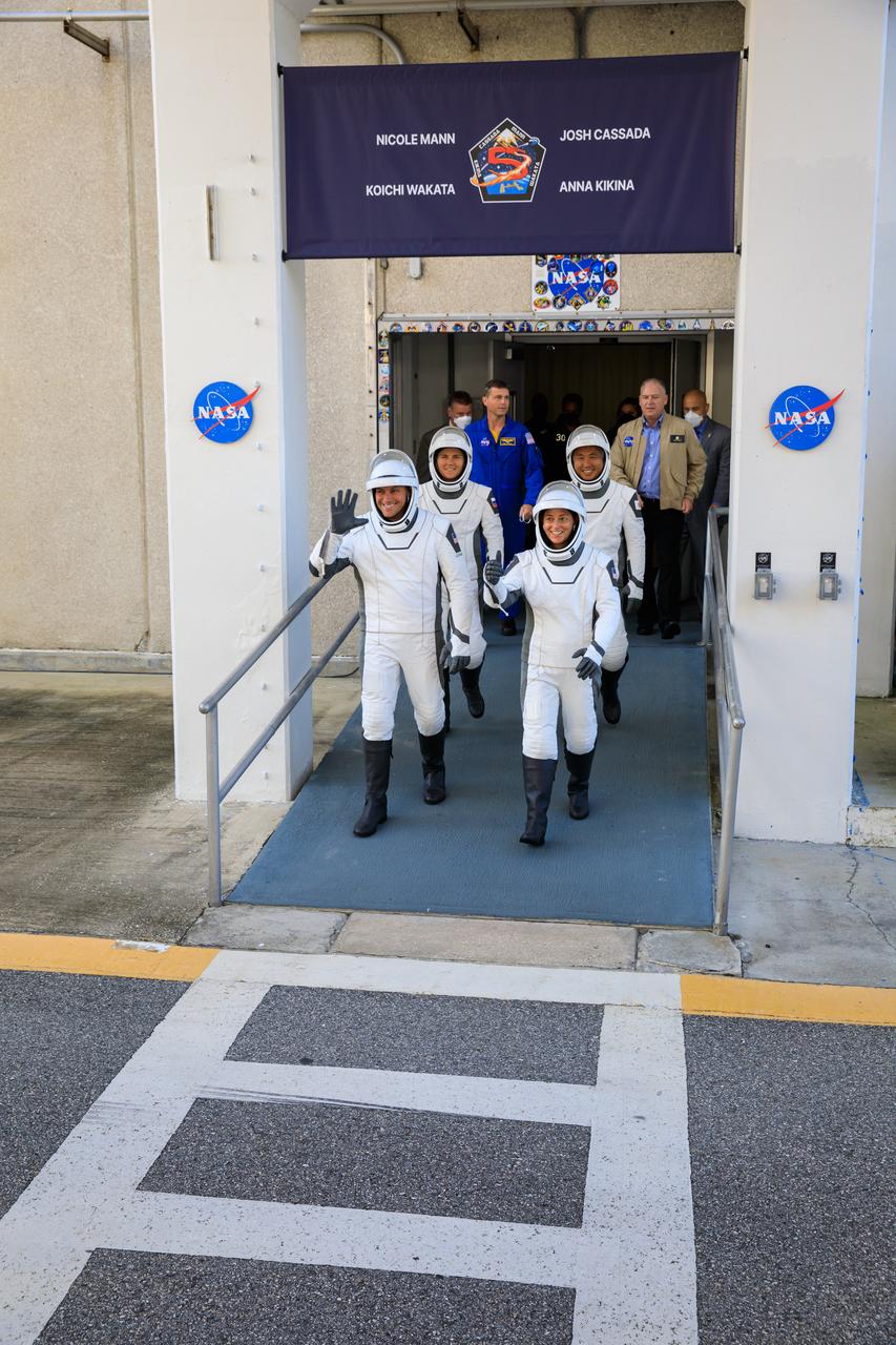 NASA’s SpaceX Crew-5 walks out of the Neil A. Armstrong Operations and Checkout Building at the agency’s Kennedy Space Center in Florida on Oct. 5, 2022. In front are NASA astronauts Josh Cassada (left) and Nicole Mann, and behind them are Roscosmos cosmonaut Anna Kikina (left) and JAXA (Japan Aerospace Exploration Agency) astronaut Koichi Wakata. They will board two Tesla vehicles for the trip to Kennedy’s Launch Complex 39A, where they will launch to the International Space Station aboard SpaceX’s Dragon Endurance spacecraft for a science expedition mission as part of NASA’s Commercial Crew Program. SpaceX’s Falcon 9 rocket lifted off at noon EDT. 