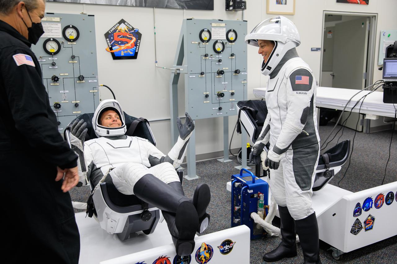 NASA astronaut Josh Cassada, left, is seated inside the crew suit-up room in the Neil A. Armstrong Operations and Checkout Building at NASA’s Kennedy Space Center in Florida on Oct. 5, 2022. To his right is NASA astronaut Nicole Mann. Cassada and Mann, along with Roscosmos cosmonaut Anna Kikina and JAXA (Japan Aerospace Exploration Agency) astronaut Koichi Wakata will launch to the International Space Station on the agency’s SpaceX Crew-5 mission. The SpaceX Falcon 9 rocket and Dragon Endurance spacecraft lifted off at noon EDT from Kennedy’s Launch Complex 39A.