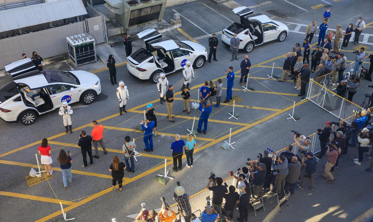 NASA’s SpaceX Crew-5 say goodbye to friends and family after exiting the Neil A. Armstrong Operations and Checkout Building at NASA’s Kennedy Space Center in Florida on Oct. 5, 2022. From left are Mission Specialists Anna Kikina, Roscosmos cosmonaut, and Koichi Wakata, of JAXA (Japan Aerospace Exploration Agency), and NASA astronauts Nicole Mann, spacecraft commander, and Josh Cassada, pilot. They will board two Tesla vehicles for the trip to Kennedy’s Launch Complex 39A, where they will launch to the International Space Station aboard SpaceX’s Dragon Endurance spacecraft for a science expedition mission as part of NASA’s Commercial Crew Program. SpaceX’s Falcon 9 rocket lifted off at noon EDT.