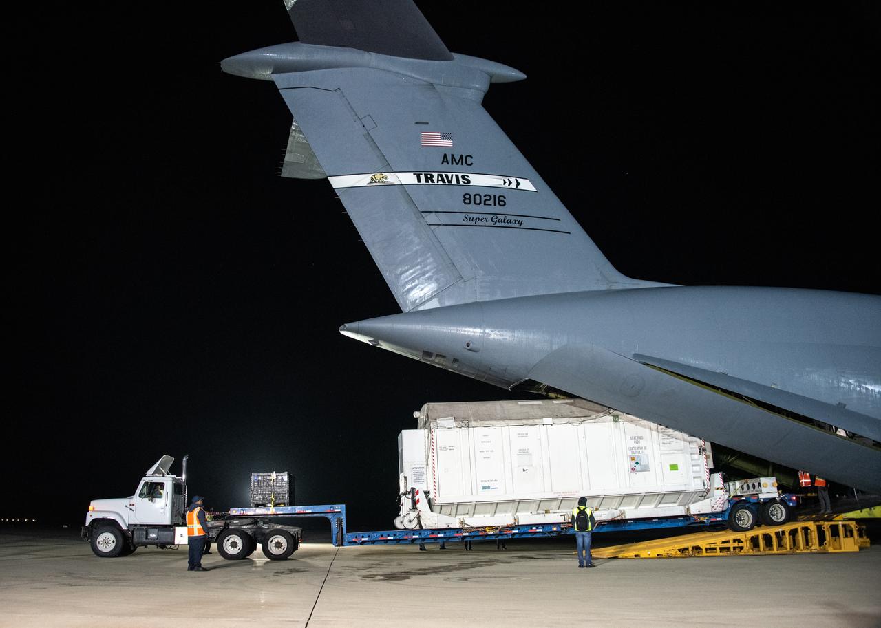 NASA’s Surface Water and Ocean Topography (SWOT) satellite arrives from France aboard a U.S. Air Force C-5 Galaxy aircraft at Vandenberg Space Force Base in California, on Oct. 16, 2022. Teams will transport the satellite to Astrotech Space Operations facility to begin final preparations for the spacecraft’s December launch atop a SpaceX Falcon 9 rocket from Vandenberg’s Space Launch Center-4 East. Jointly developed by NASA and Centre National D'Etudes Spatiales, with contributions from the Canadian Space Agency (CSA) and United Kingdom Space Agency, SWOT is the first satellite mission that will observe nearly all water on Earth’s surface, measuring the height of water in the planet’s lakes, rivers, reservoirs, and the ocean. 