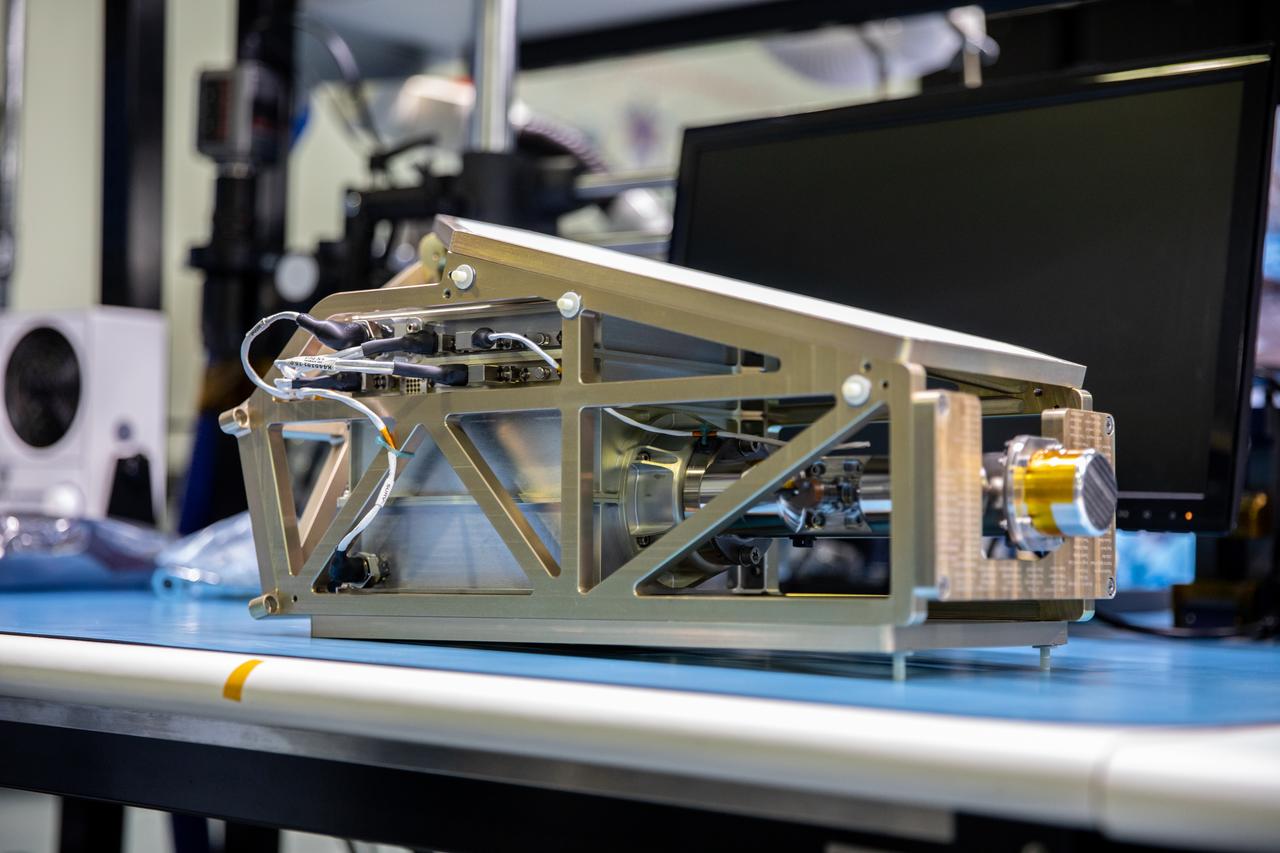 Engineers prepare the Mass Spectrometer Observing Lunar Operations (MSolo) instrument for the multilayer insulation installation inside Kennedy Space Center’s Space Station Processing Facility on Oct. 19, 2022. The activity is in preparation for the Polar Resources Ice Mining Experiment-1 (PRIME-1) mission, which will be the first in-situ resource utilization demonstration on the Moon. MSolo is a commercial off-the-shelf mass spectrometer modified to work in space and will help analyze the chemical makeup of landing sites on the Moon, as well as study water on the lunar surface. Researchers and engineers are preparing MSolo instruments to launch on four robotic missions as part of NASA’s Commercial Lunar Payload Services – commercial deliveries beginning in 2023 that will perform science experiments, test technologies, and demonstrate capabilities to help NASA explore the Moon and prepare for crewed missions to the lunar surface.