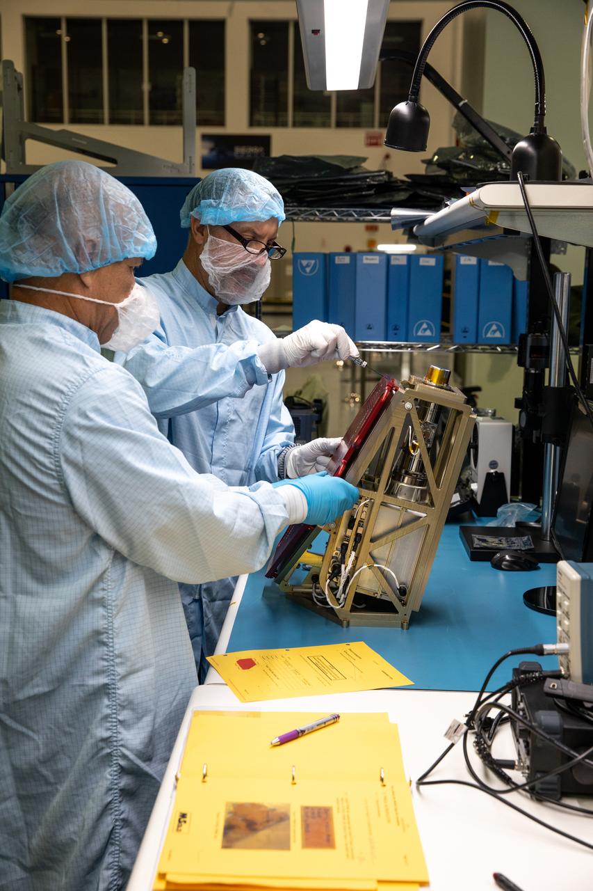 Engineers prepare the Mass Spectrometer Observing Lunar Operations (MSolo) instrument for the multilayer insulation installation inside Kennedy Space Center’s Space Station Processing Facility on Oct. 19, 2022. The activity is in preparation for the Polar Resources Ice Mining Experiment-1 (PRIME-1) mission, which will be the first in-situ resource utilization demonstration on the Moon. MSolo is a commercial off-the-shelf mass spectrometer modified to work in space and will help analyze the chemical makeup of landing sites on the Moon, as well as study water on the lunar surface. Researchers and engineers are preparing MSolo instruments to launch on four robotic missions as part of NASA’s Commercial Lunar Payload Services – commercial deliveries beginning in 2023 that will perform science experiments, test technologies, and demonstrate capabilities to help NASA explore the Moon and prepare for crewed missions to the lunar surface.