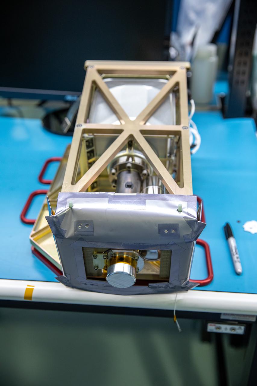 Engineers prepare the Mass Spectrometer Observing Lunar Operations (MSolo) instrument for the multilayer insulation installation inside Kennedy Space Center’s Space Station Processing Facility on Oct. 19, 2022. The activity is in preparation for the Polar Resources Ice Mining Experiment-1 (PRIME-1) mission, which will be the first in-situ resource utilization demonstration on the Moon. MSolo is a commercial off-the-shelf mass spectrometer modified to work in space and will help analyze the chemical makeup of landing sites on the Moon, as well as study water on the lunar surface. Researchers and engineers are preparing MSolo instruments to launch on four robotic missions as part of NASA’s Commercial Lunar Payload Services – commercial deliveries beginning in 2023 that will perform science experiments, test technologies, and demonstrate capabilities to help NASA explore the Moon and prepare for crewed missions to the lunar surface.